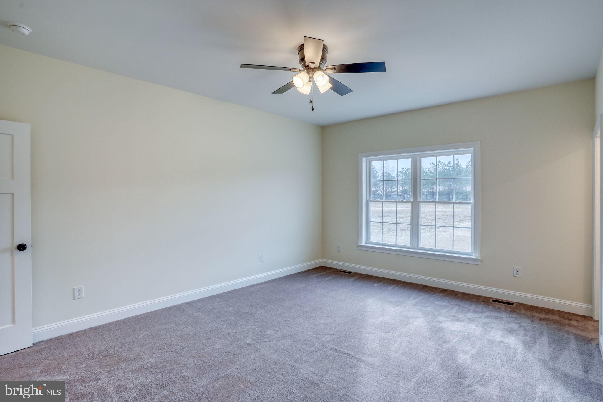 3150 Old Sharptown Road Laurel, DE 19956 - Photo 34 of 46 a view of an empty room with a window