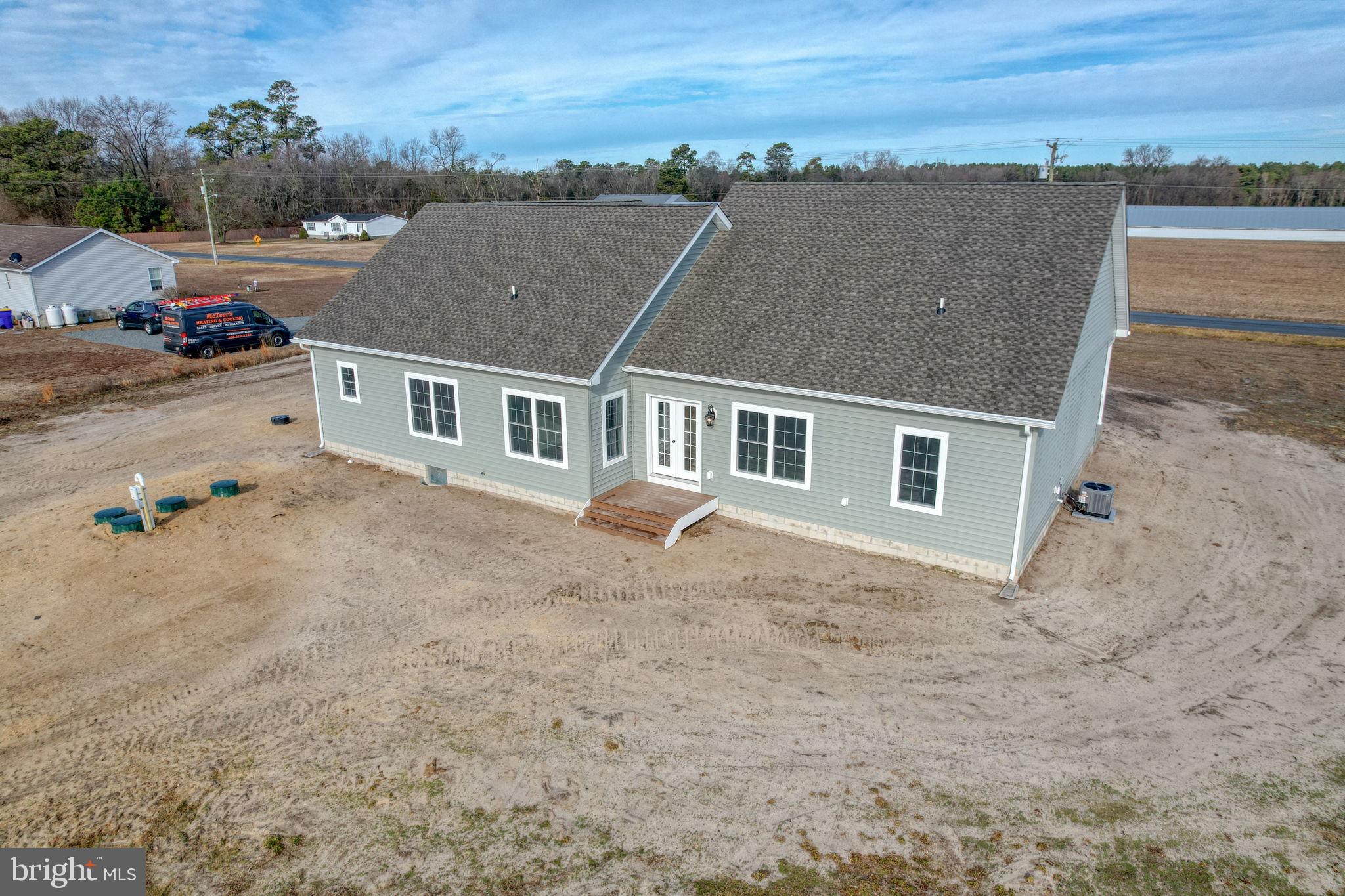 3150 Old Sharptown Road Laurel, DE 19956 - Photo 6 of 46 an aerial view of residential houses with outdoor space and ocean view