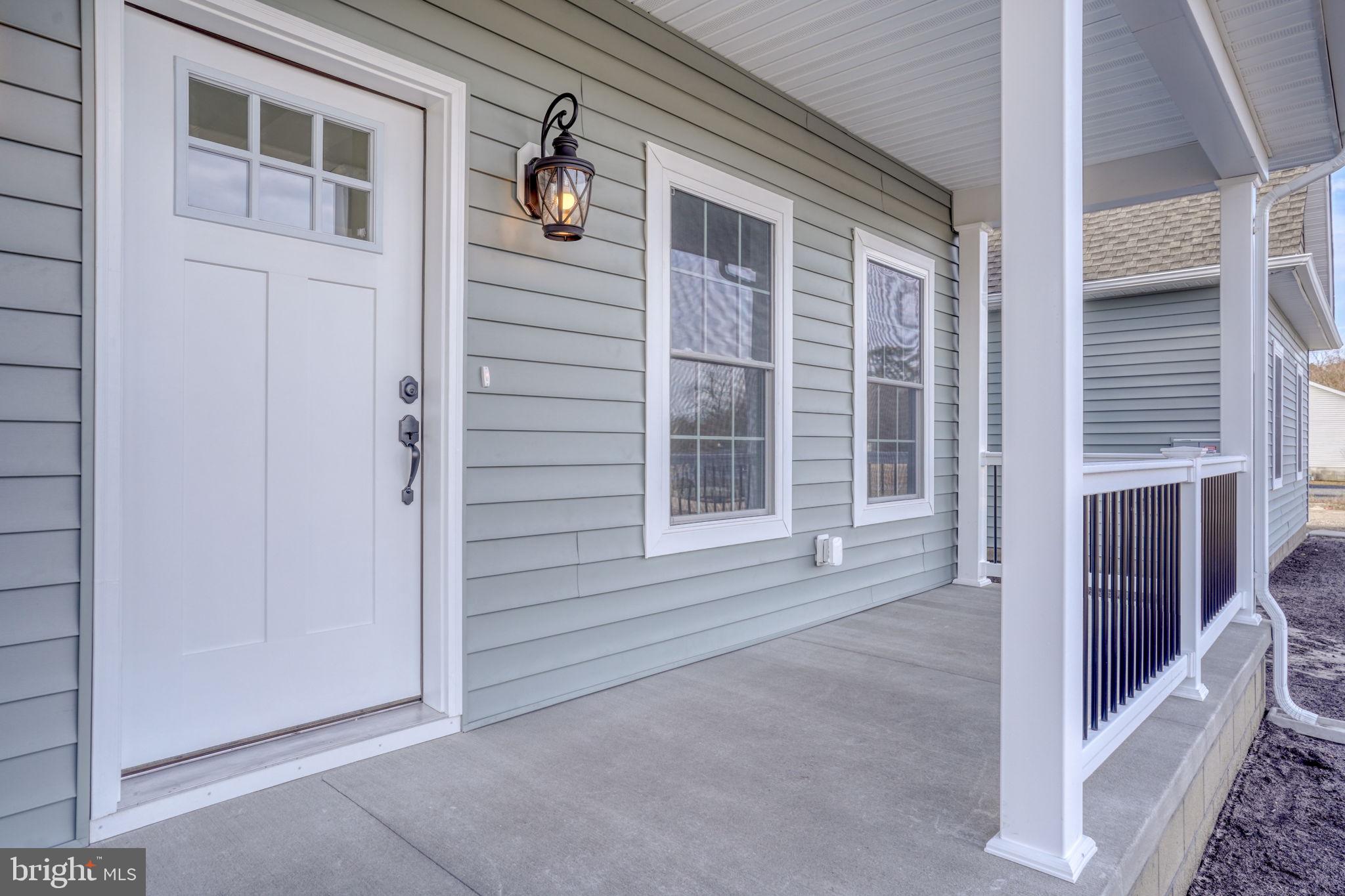 3150 Old Sharptown Road Laurel, DE 19956 - Photo 10 of 46 a view of front door of house