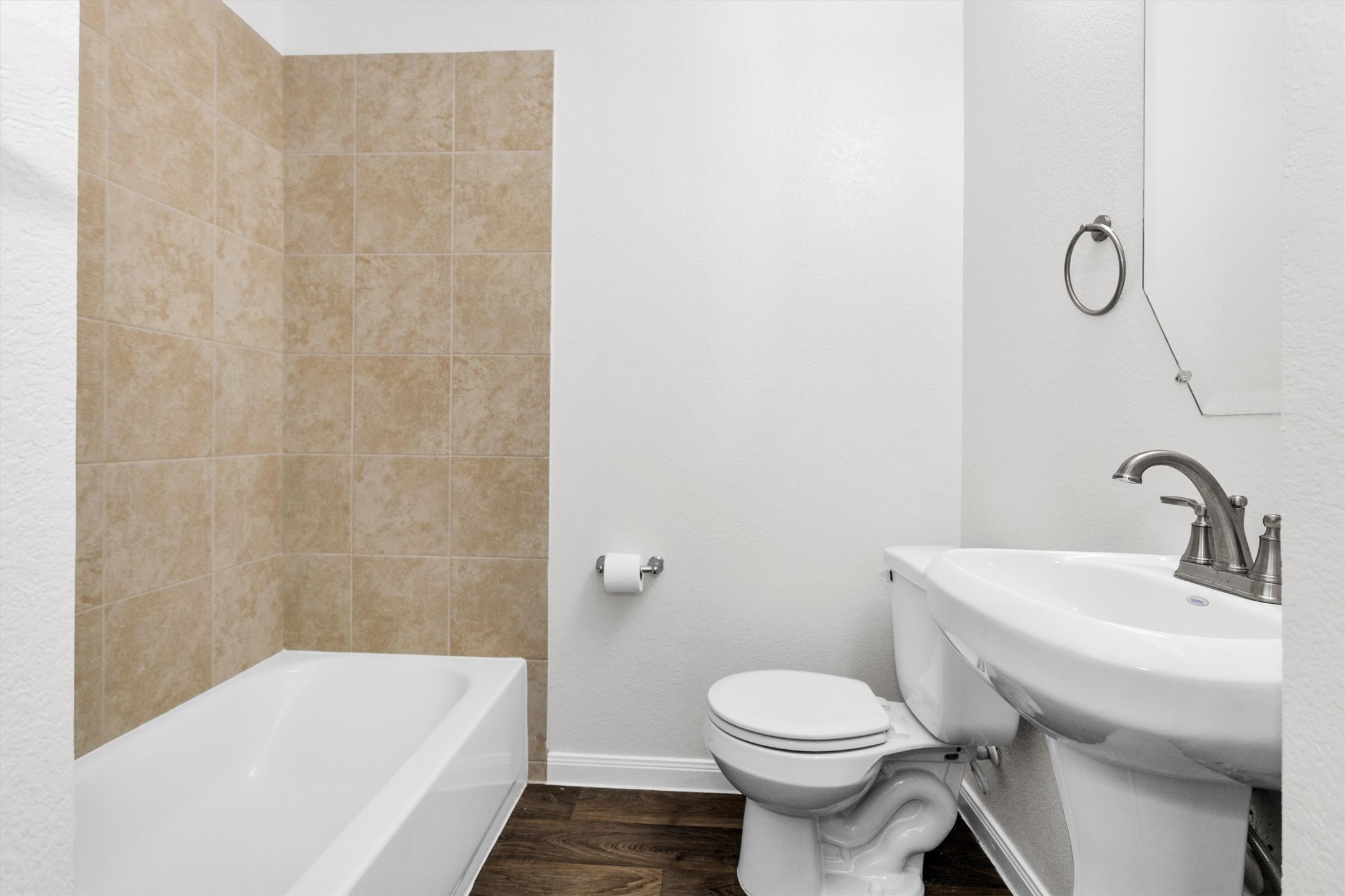 15134 Austin Road Willis, TX 77378 - Photo 17 of 20 a bathroom with a sink a toilet and bathtub