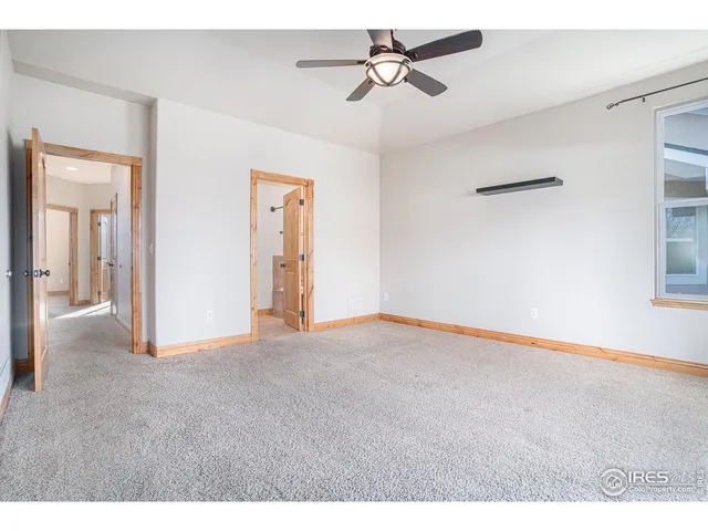 a bathroom with a sink a mirror and a shower