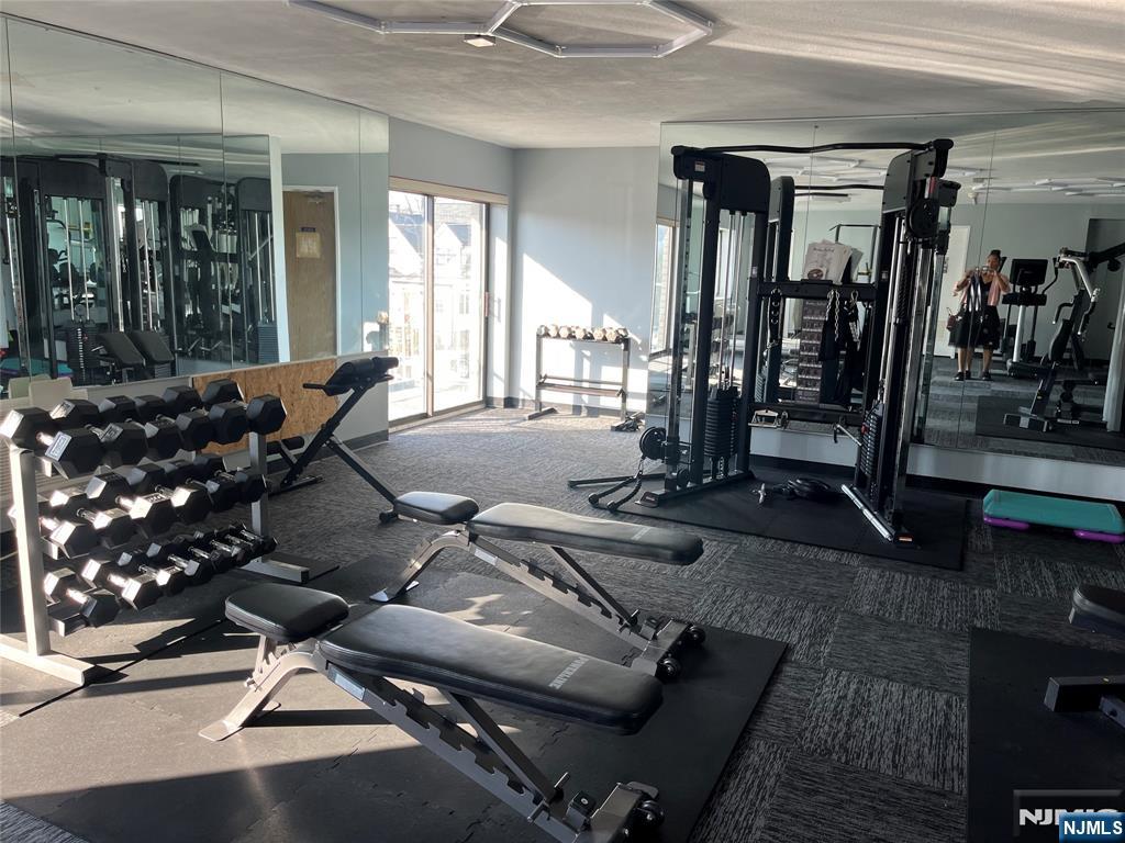 281 Park Street, Unit 3B Hackensack, NJ 07601 - Photo 9 of 11 a view of a room with gym equipment