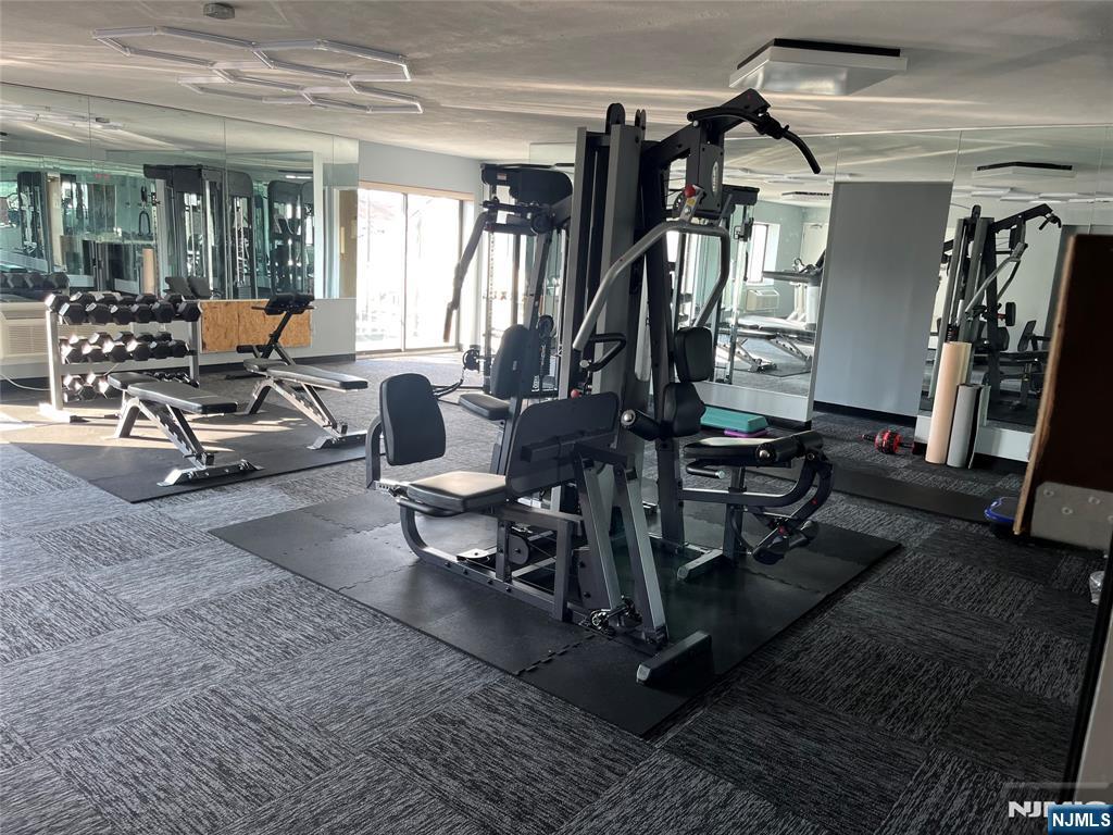 281 Park Street, Unit 3B Hackensack, NJ 07601 - Photo 10 of 11 a living room filled with furniture
