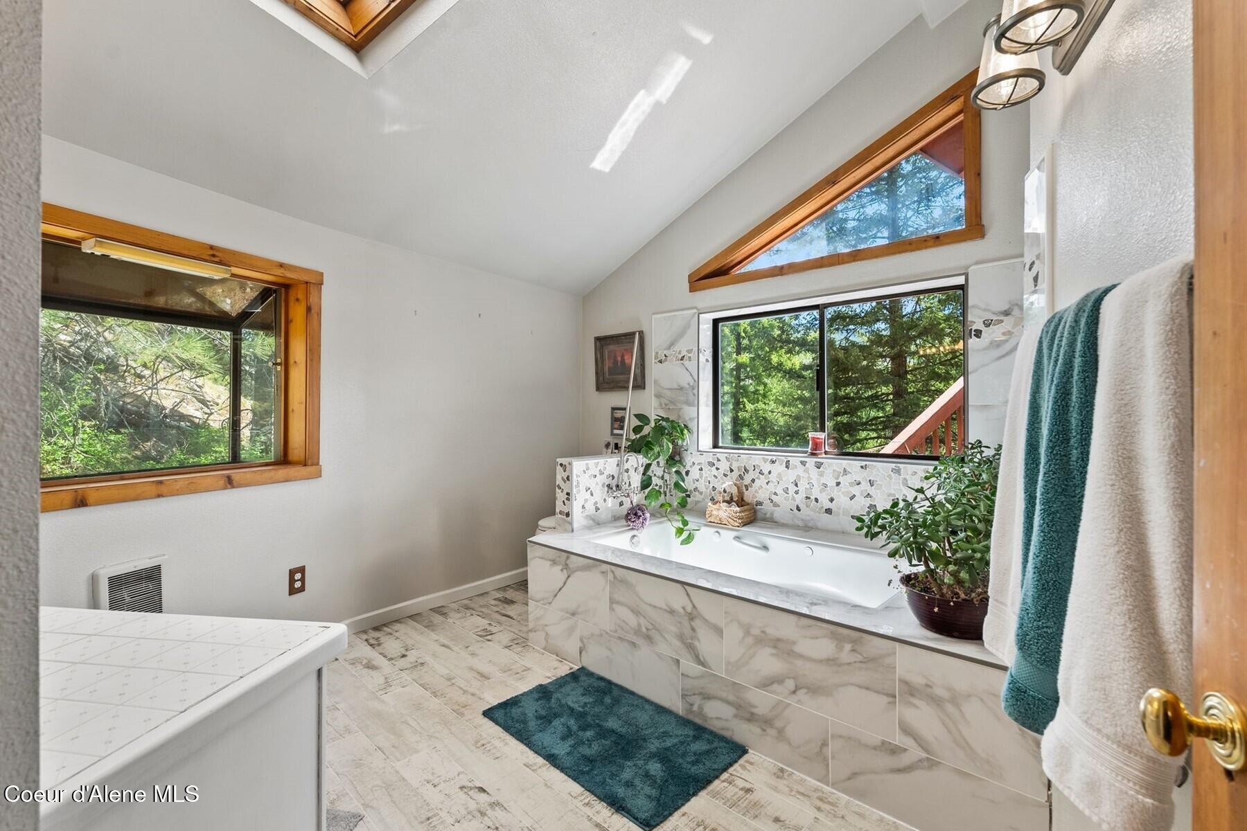 4057 Jewel Lake Road Sagle, ID 83860 - Photo 16 of 52 Main level bathroom