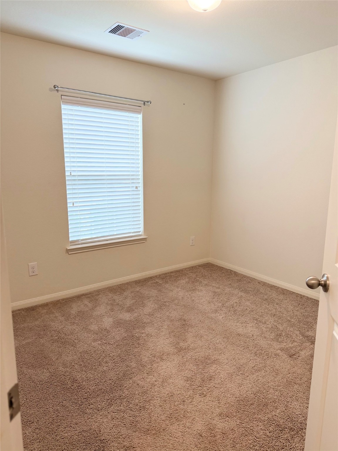 22418 Threefold Ridge Drive Hockley, TX 77447 - Photo 15 of 19 an empty room with a window
