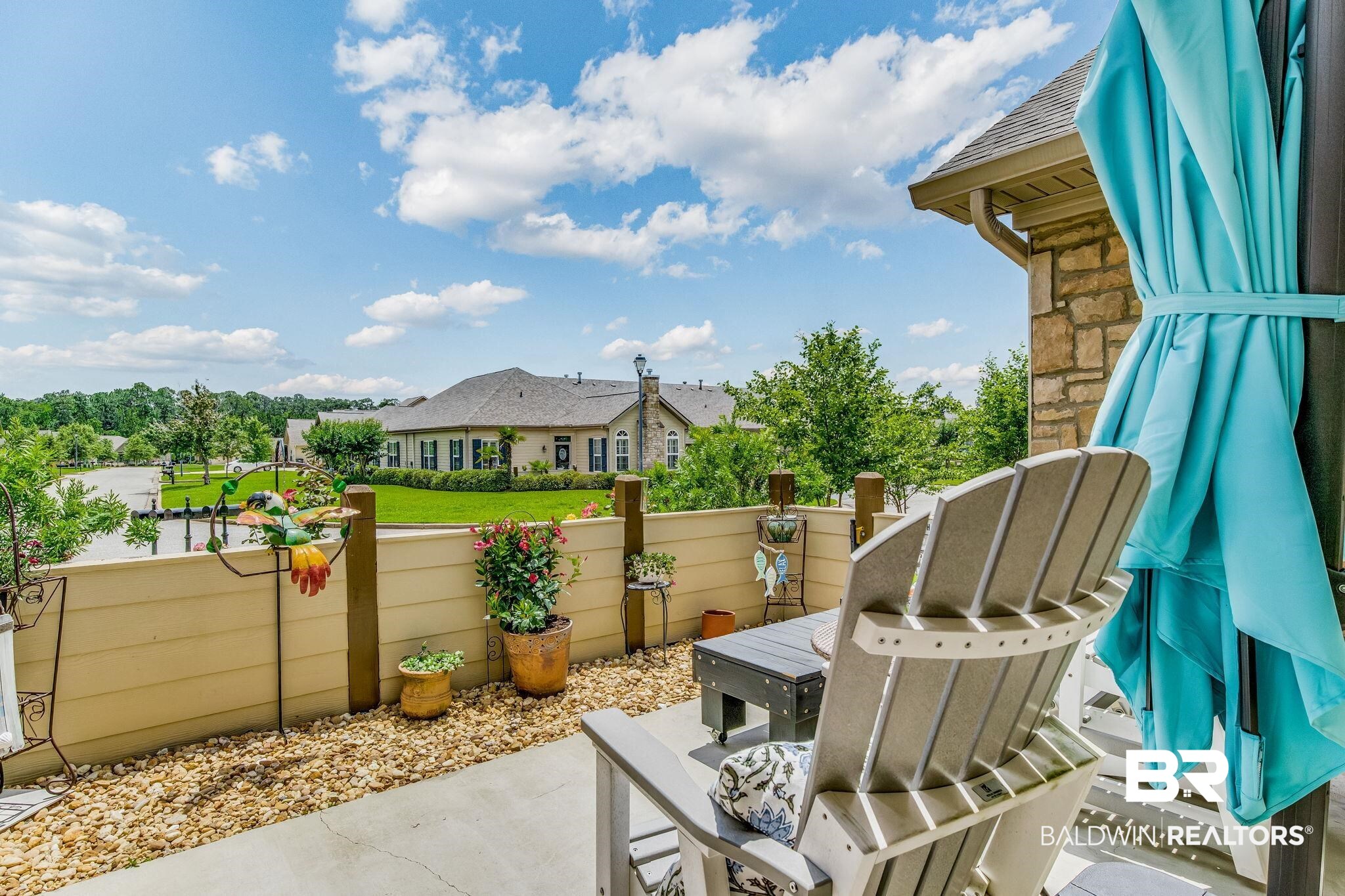 303 Holmes Avenue, Unit 303 Foley, AL 36535 - Photo 5 of 44 Tree line view from Patio
