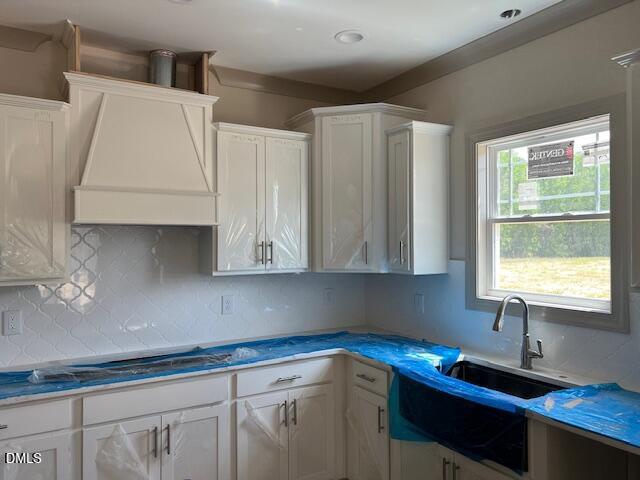 169 Big Pine Road Clayton, NC 27520 - Photo 4 of 14 a kitchen with a sink cabinets and window