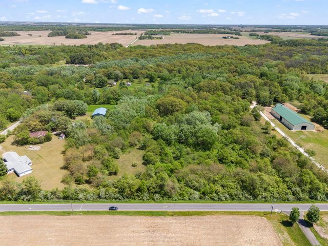 an aerial view of a yard with houses