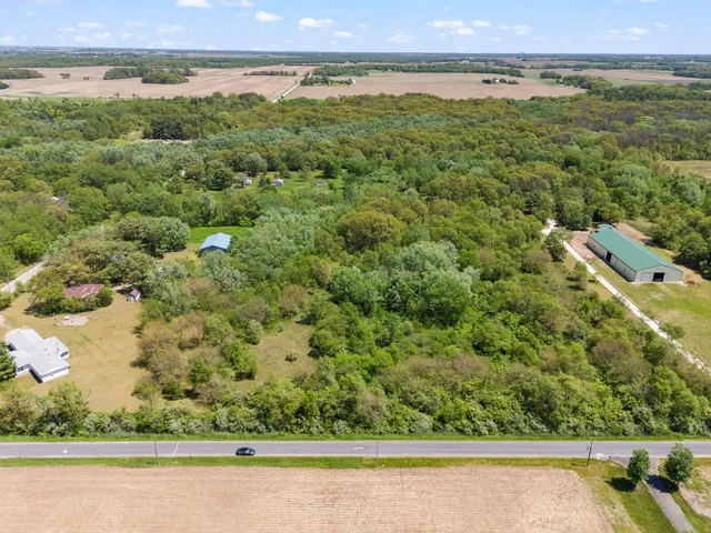 an aerial view of a yard with houses