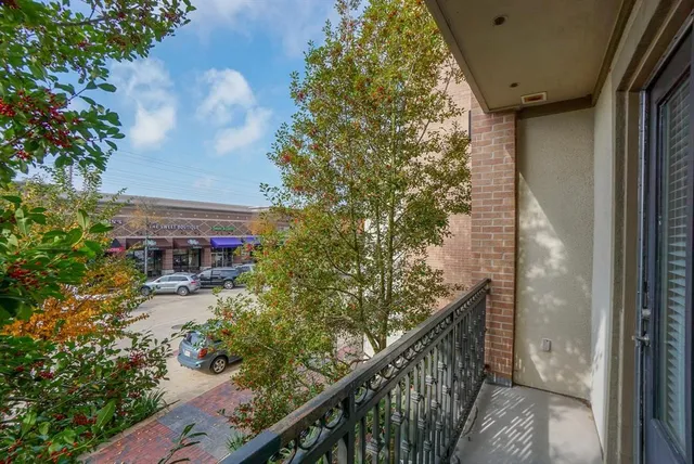 a kitchen with stainless steel appliances a sink and a refrigerator