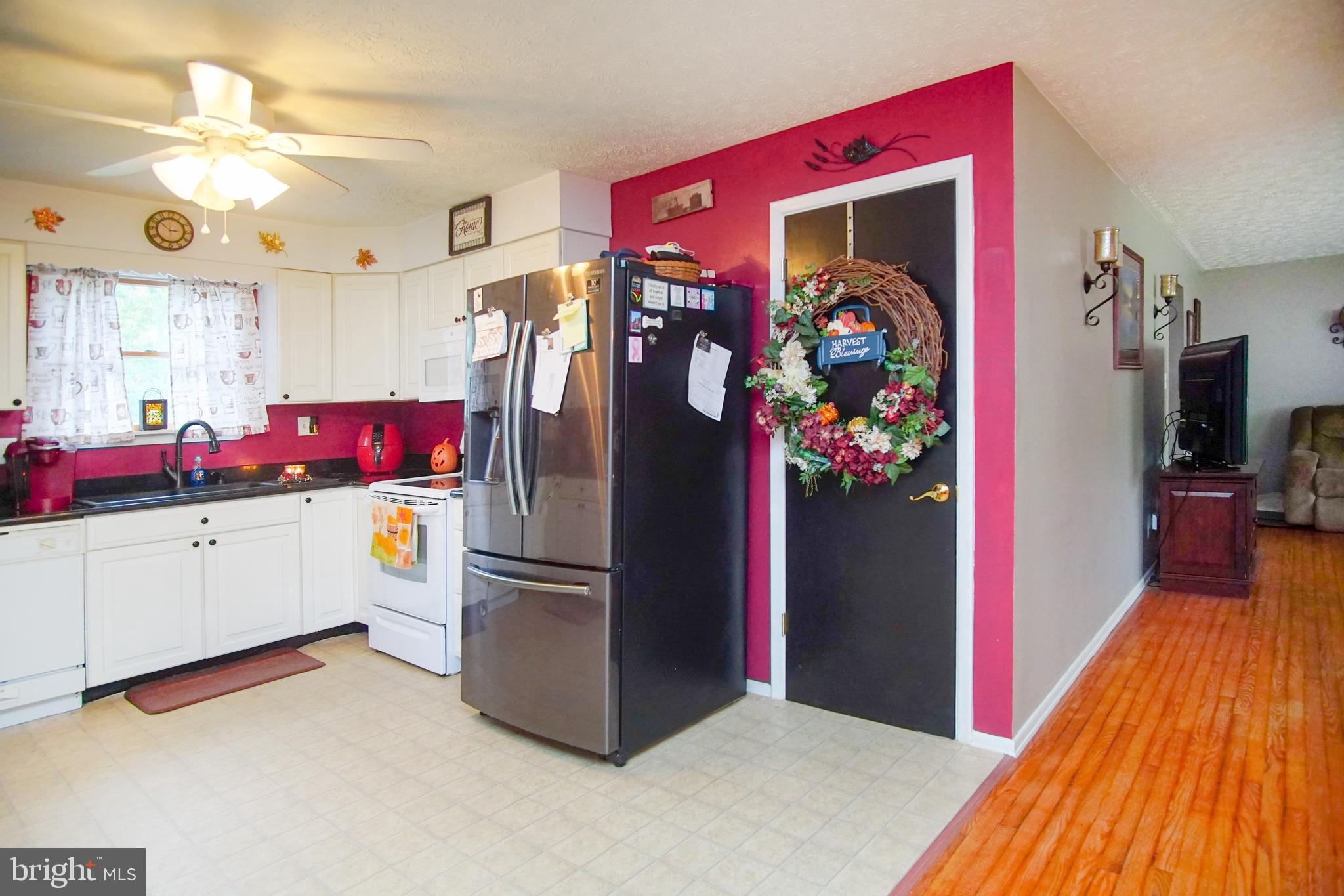 12806 Winchester Road Southwest Cumberland, MD 21502 - Photo 21 of 54 Kitchen and hallway into living room...
