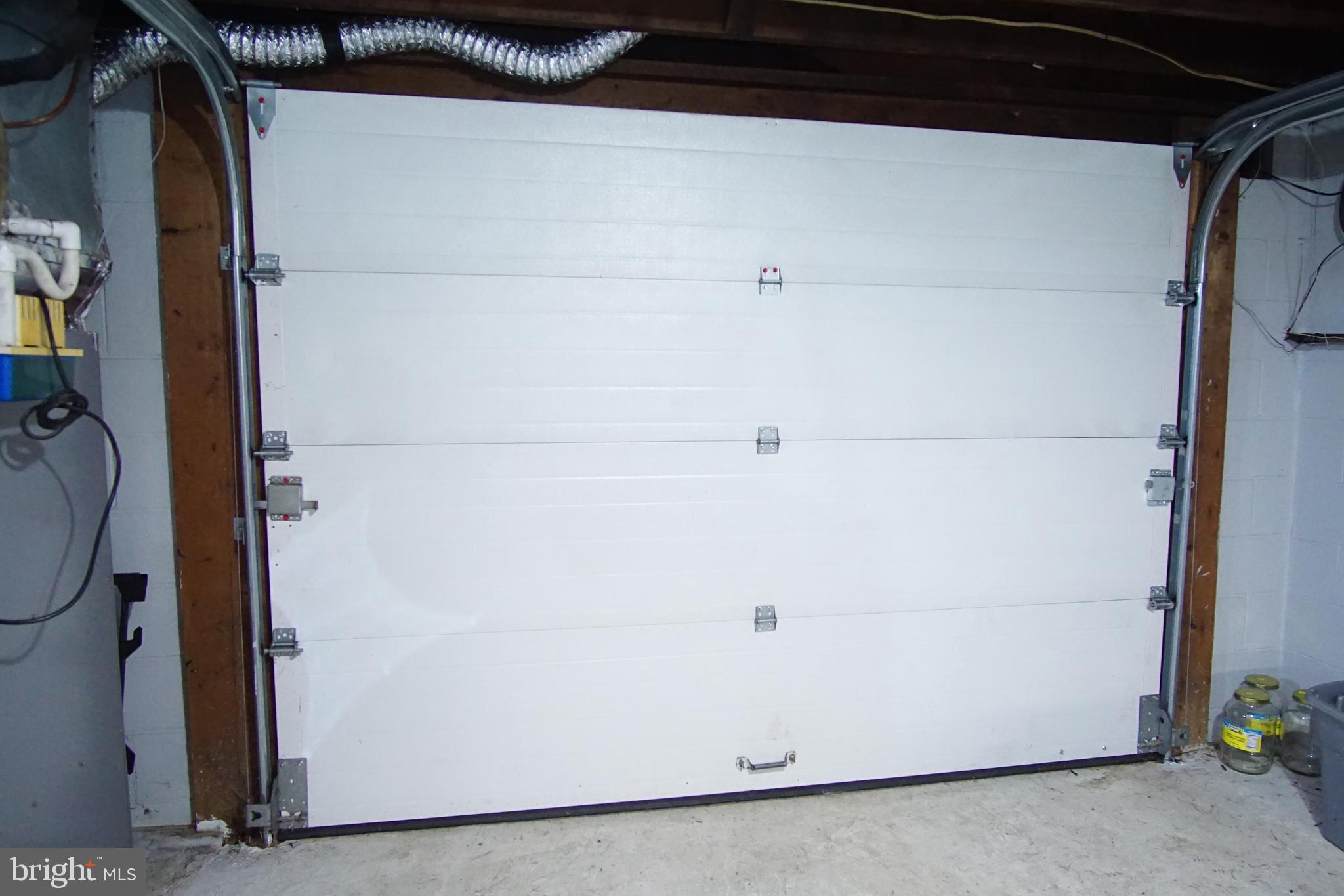 12806 Winchester Road Southwest Cumberland, MD 21502 - Photo 54 of 54 Garage door in basement...
