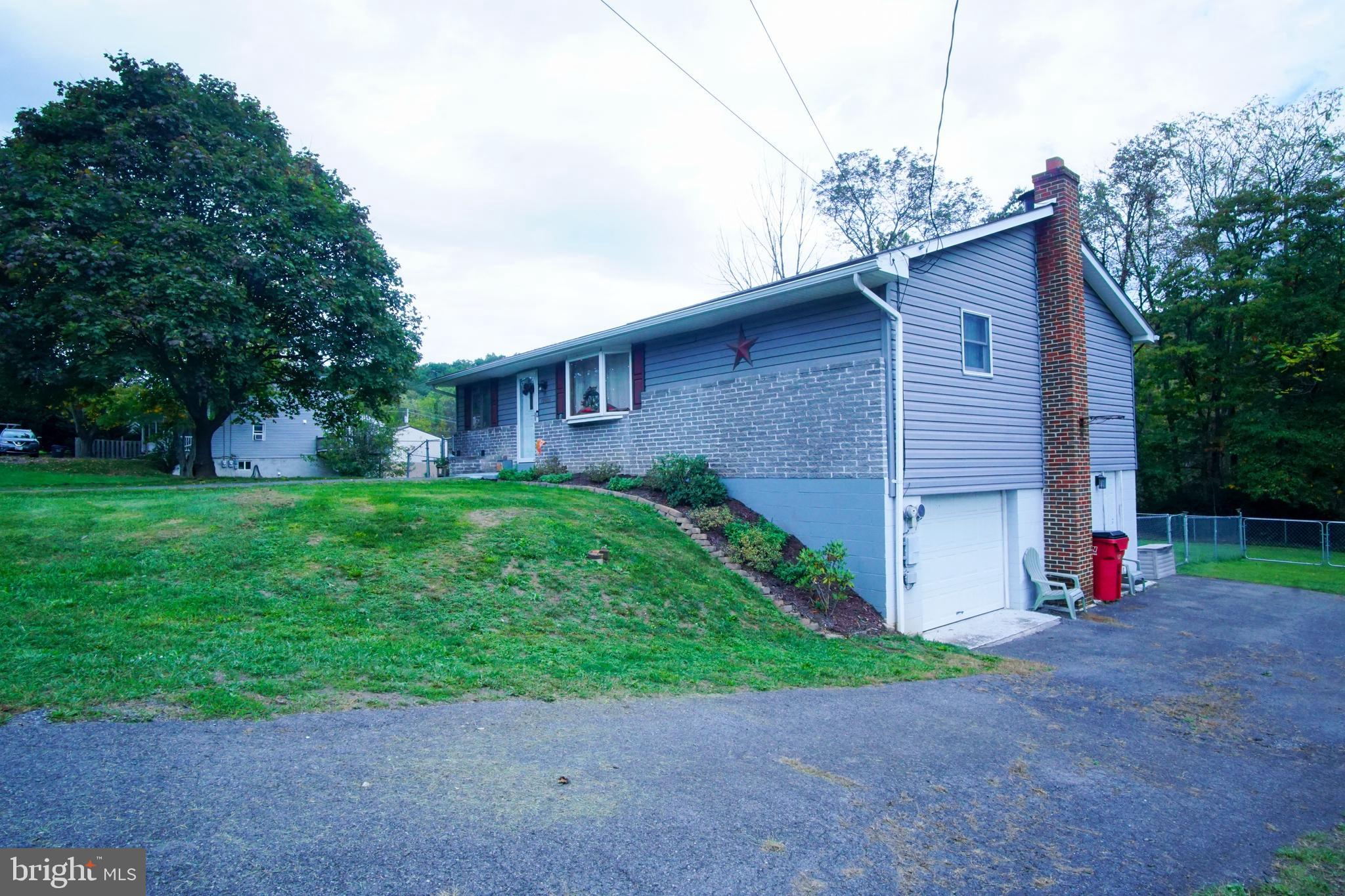 12806 Winchester Road Southwest Cumberland, MD 21502 - Photo 8 of 54 Large side driveway to garage...