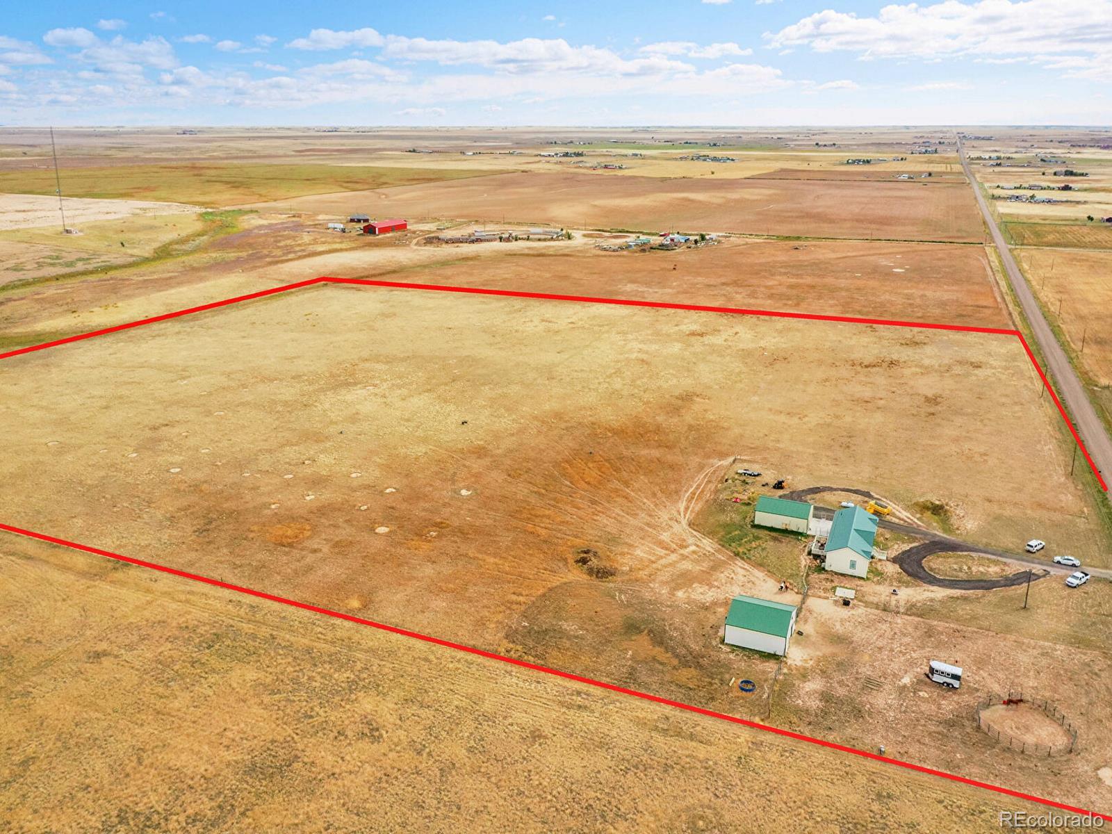 10660 Schumaker Road Bennett, CO 80102 - Photo 45 of 50 a view of an ocean and beach