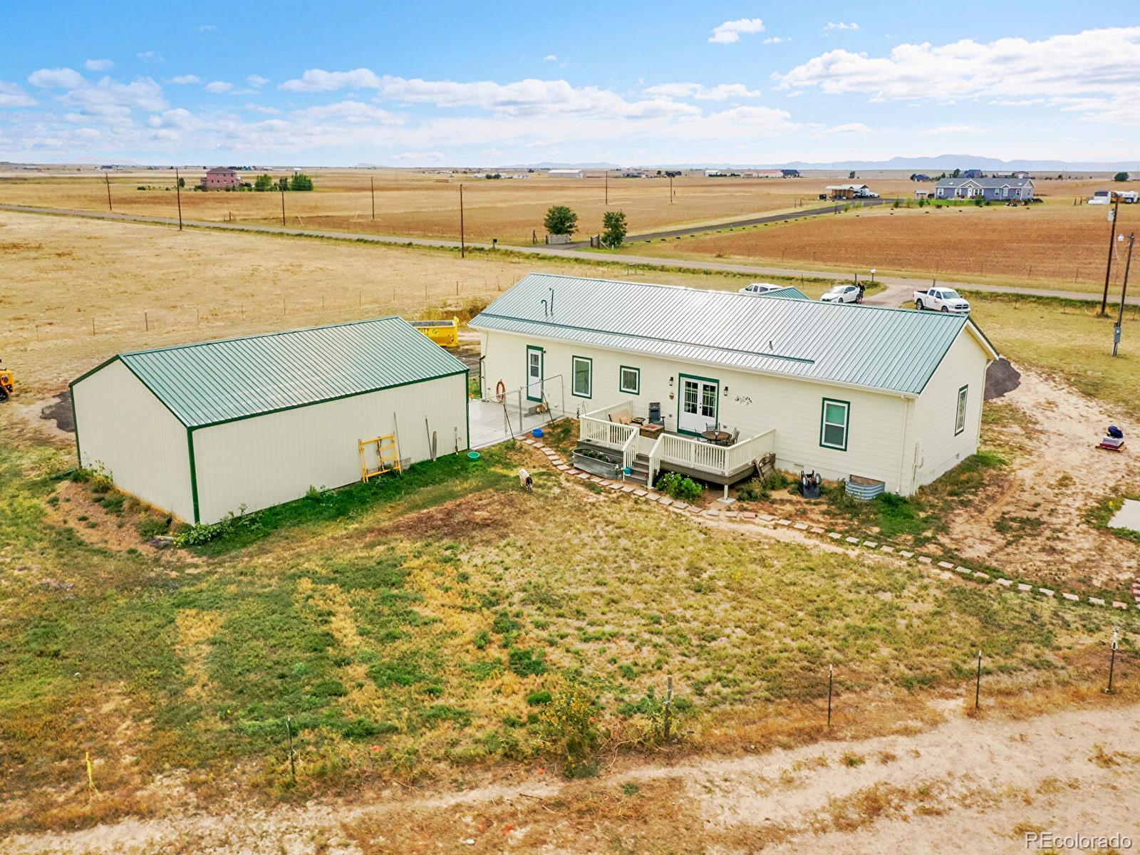 10660 Schumaker Road Bennett, CO 80102 - Photo 50 of 50 a view of an ocean with city
