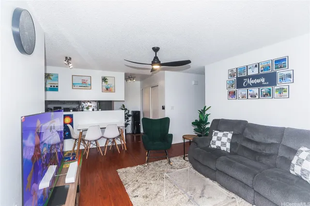 a living room with furniture and a table