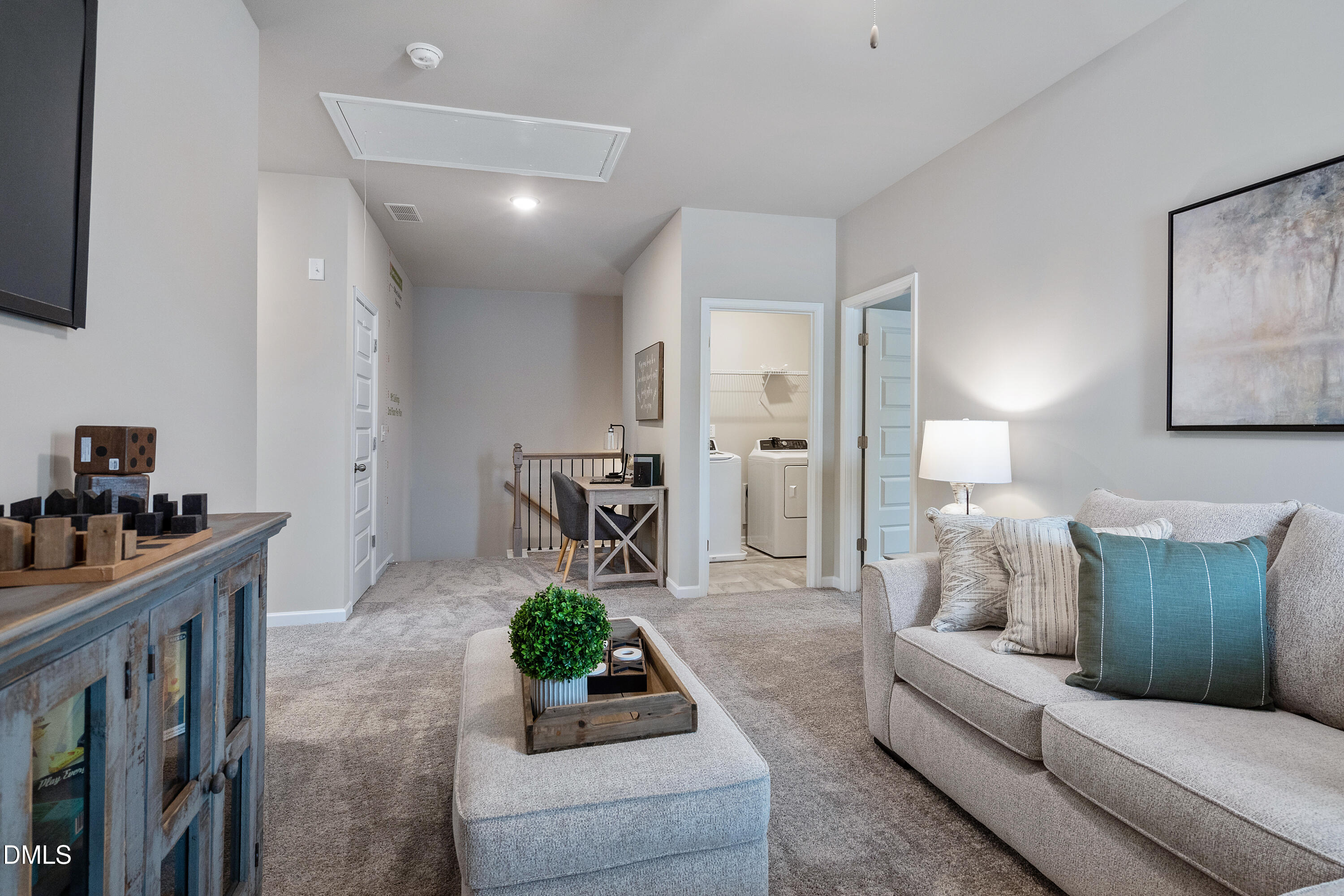 203 Courtside Drive Dunn, NC 28334 - Photo 22 of 38 a living room with furniture and a table