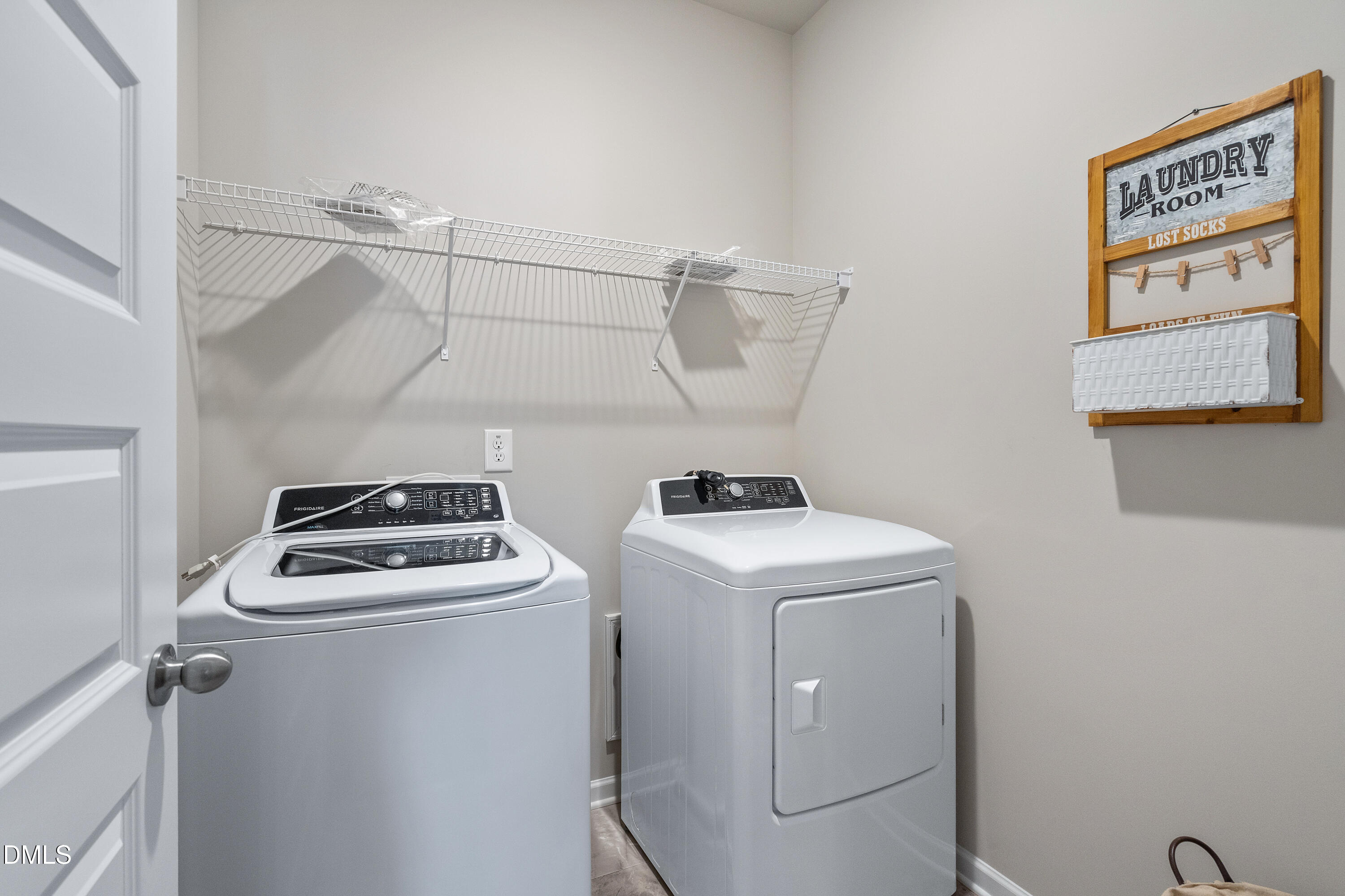 203 Courtside Drive Dunn, NC 28334 - Photo 23 of 38 a utility room with dryer and washer