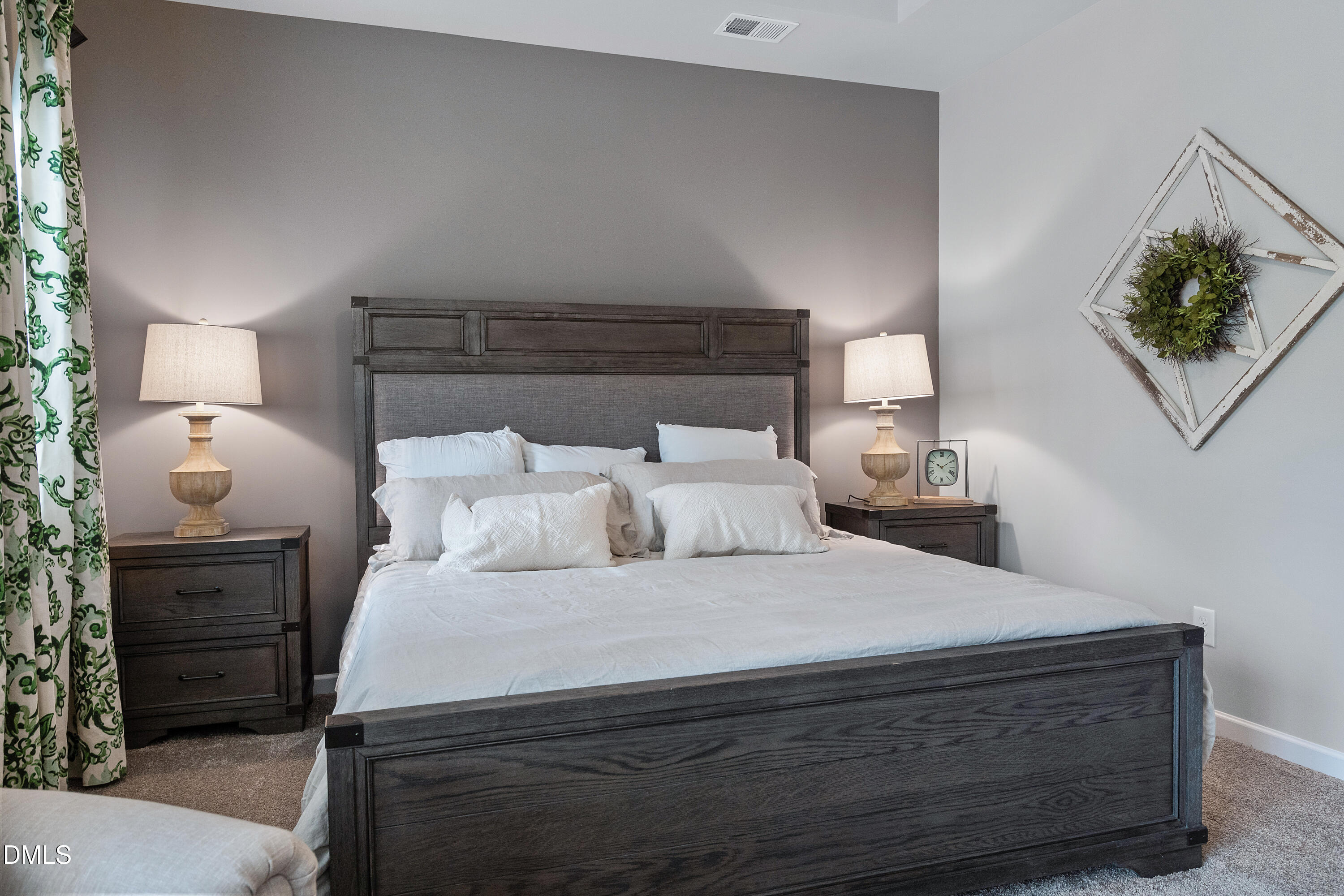 203 Courtside Drive Dunn, NC 28334 - Photo 26 of 38 a bedroom with a bed and a night stand