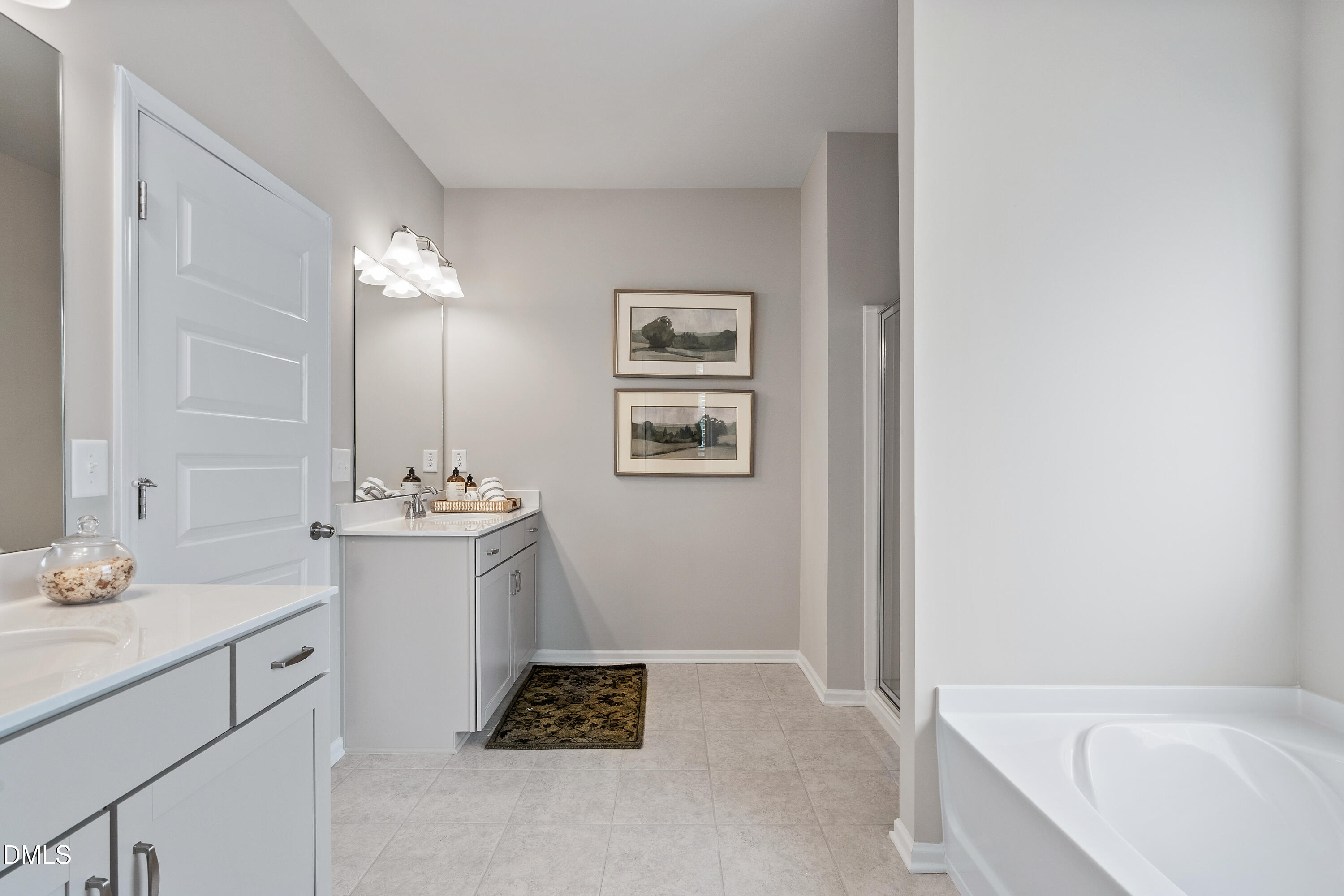 203 Courtside Drive Dunn, NC 28334 - Photo 31 of 38 a bathroom with a sink and a mirror
