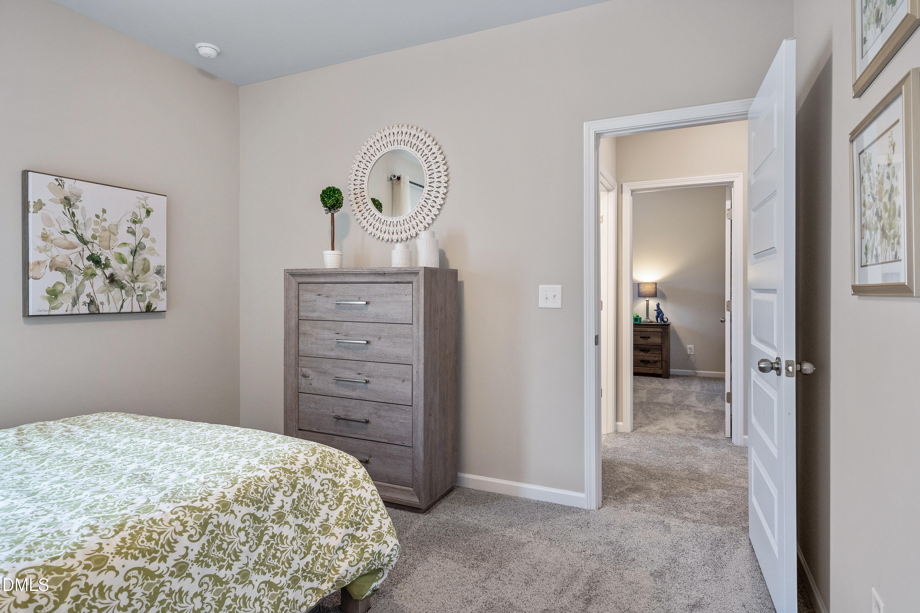 203 Courtside Drive Dunn, NC 28334 - Photo 33 of 38 a bedroom with a bed and a dresser