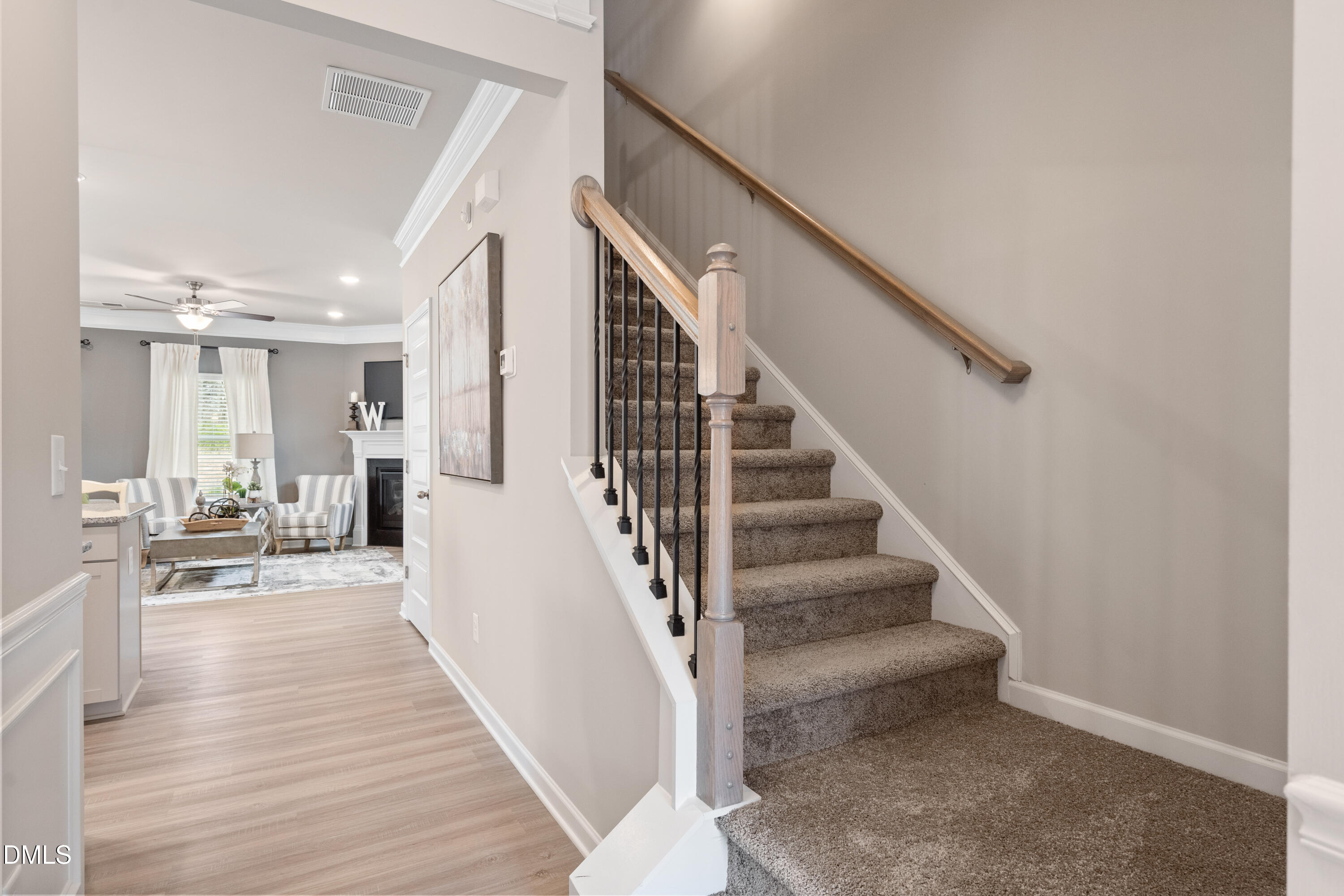 203 Courtside Drive Dunn, NC 28334 - Photo 4 of 38 a view of entryway and hall with wooden floor