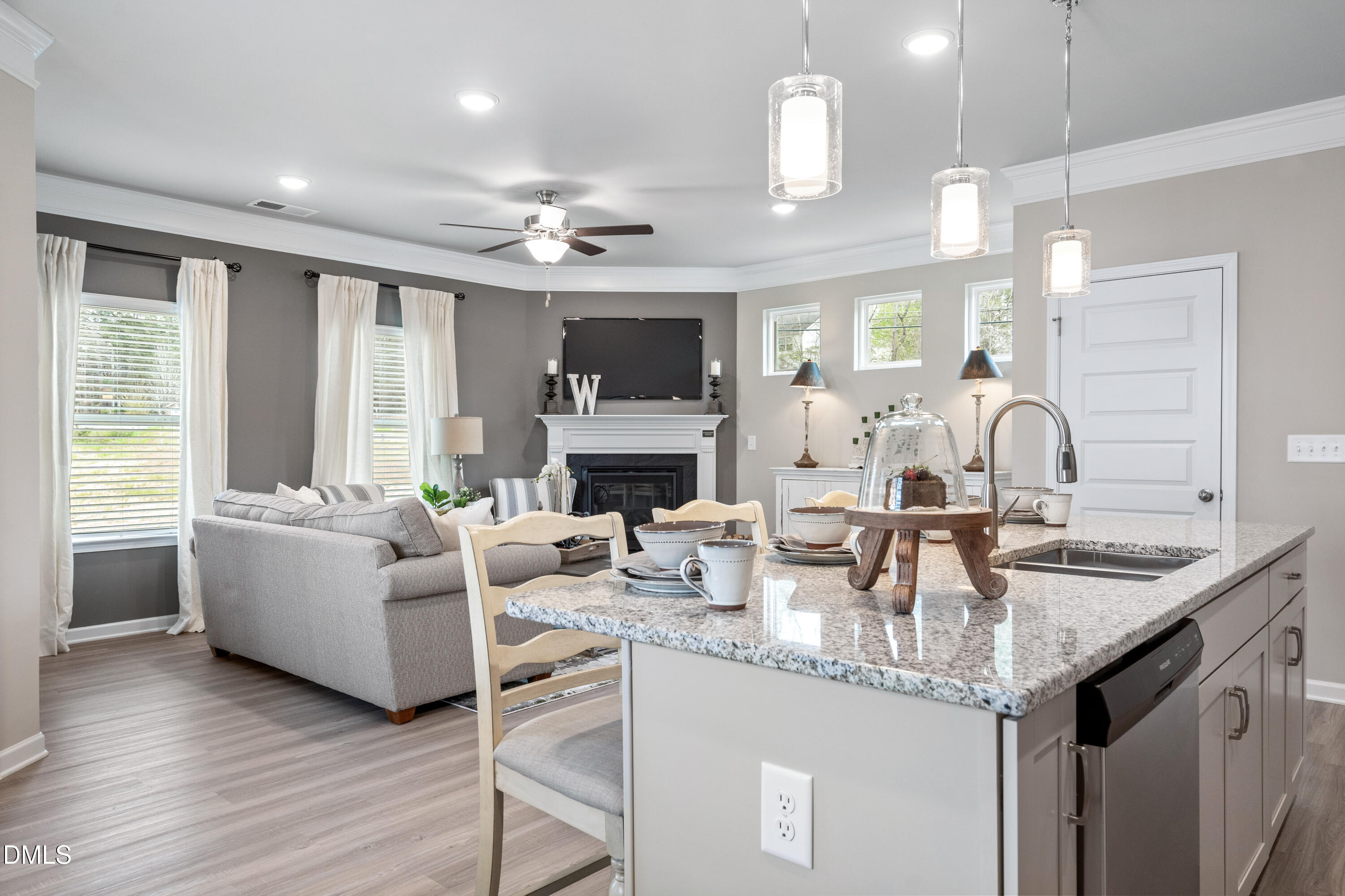 203 Courtside Drive Dunn, NC 28334 - Photo 8 of 38 a living room with fireplace furniture and a wooden floor