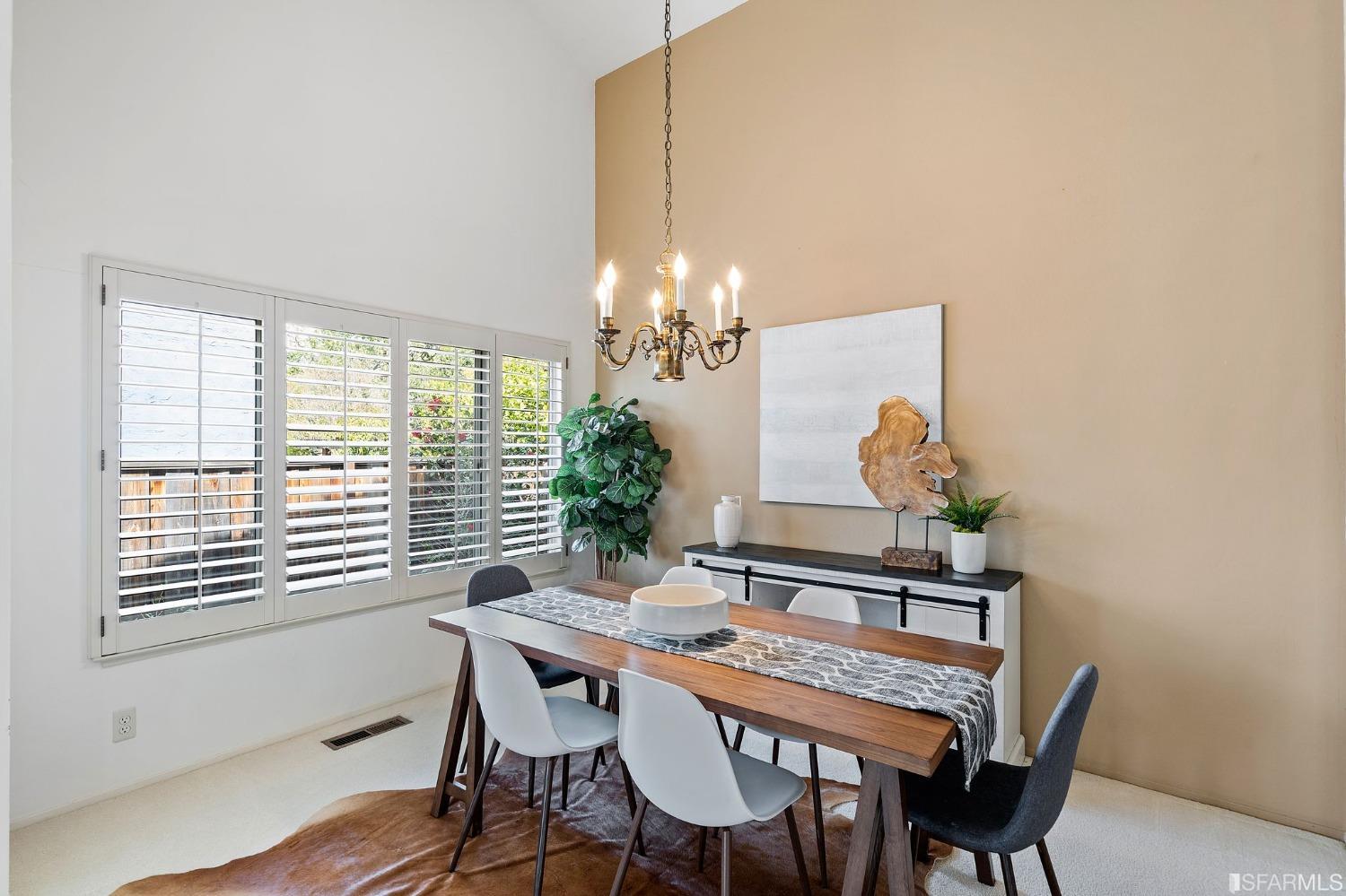 2590 Fox Circle Walnut Creek, CA 94596 - Photo 12 of 68 a view of a dining room with furniture and wooden floor