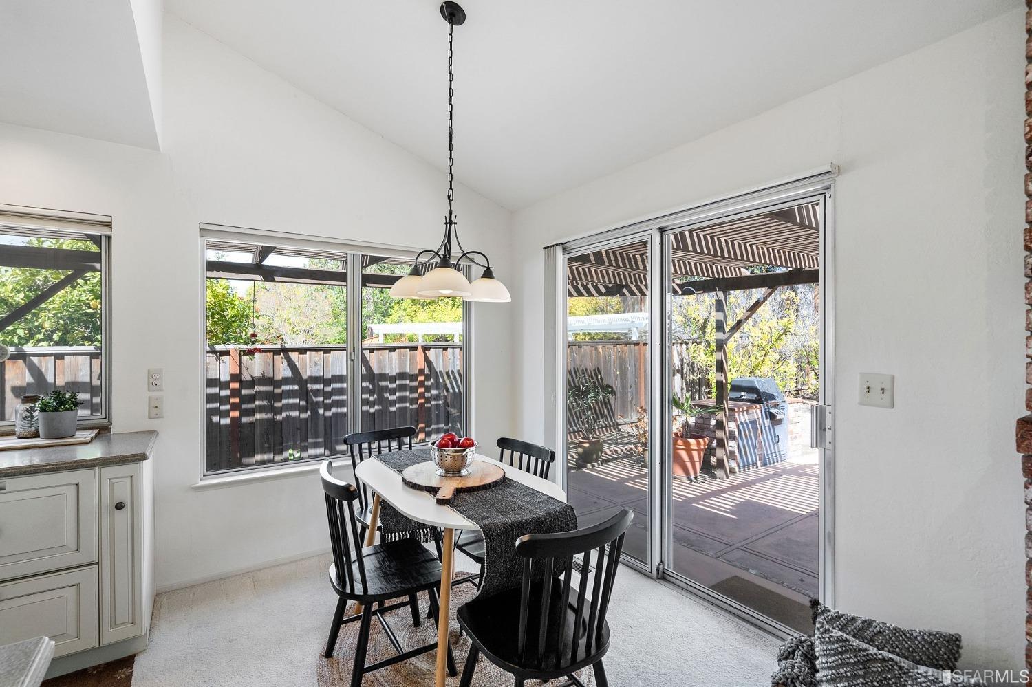 2590 Fox Circle Walnut Creek, CA 94596 - Photo 13 of 68 a view of a dining room with furniture window and outside view