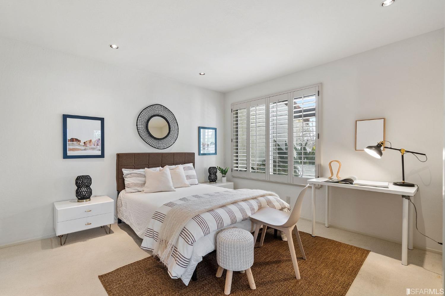 2590 Fox Circle Walnut Creek, CA 94596 - Photo 18 of 68 a bedroom with a bed and a table with chair