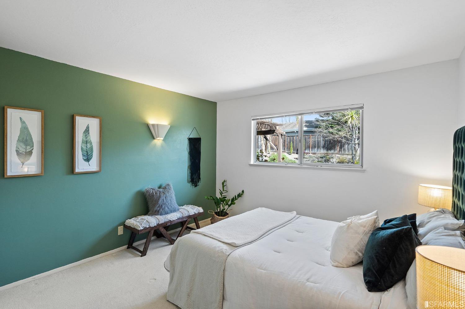 2590 Fox Circle Walnut Creek, CA 94596 - Photo 20 of 68 a bedroom with a bed and a painting on the wall