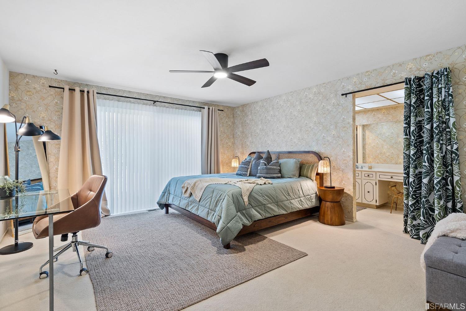 2590 Fox Circle Walnut Creek, CA 94596 - Photo 23 of 68 a bedroom with a large bed and a chandelier