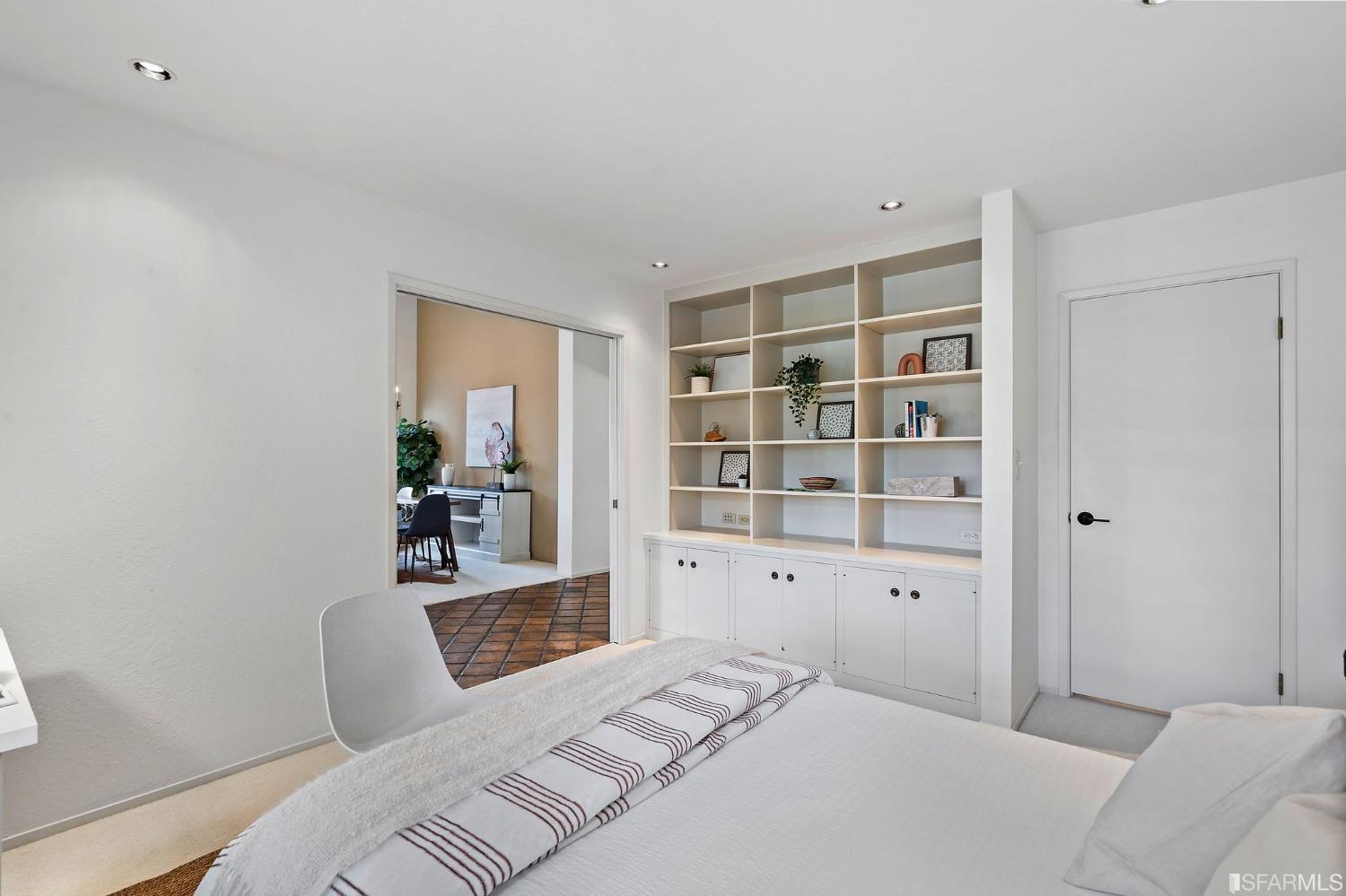 2590 Fox Circle Walnut Creek, CA 94596 - Photo 26 of 68 a bedroom with a bed and a book shelf