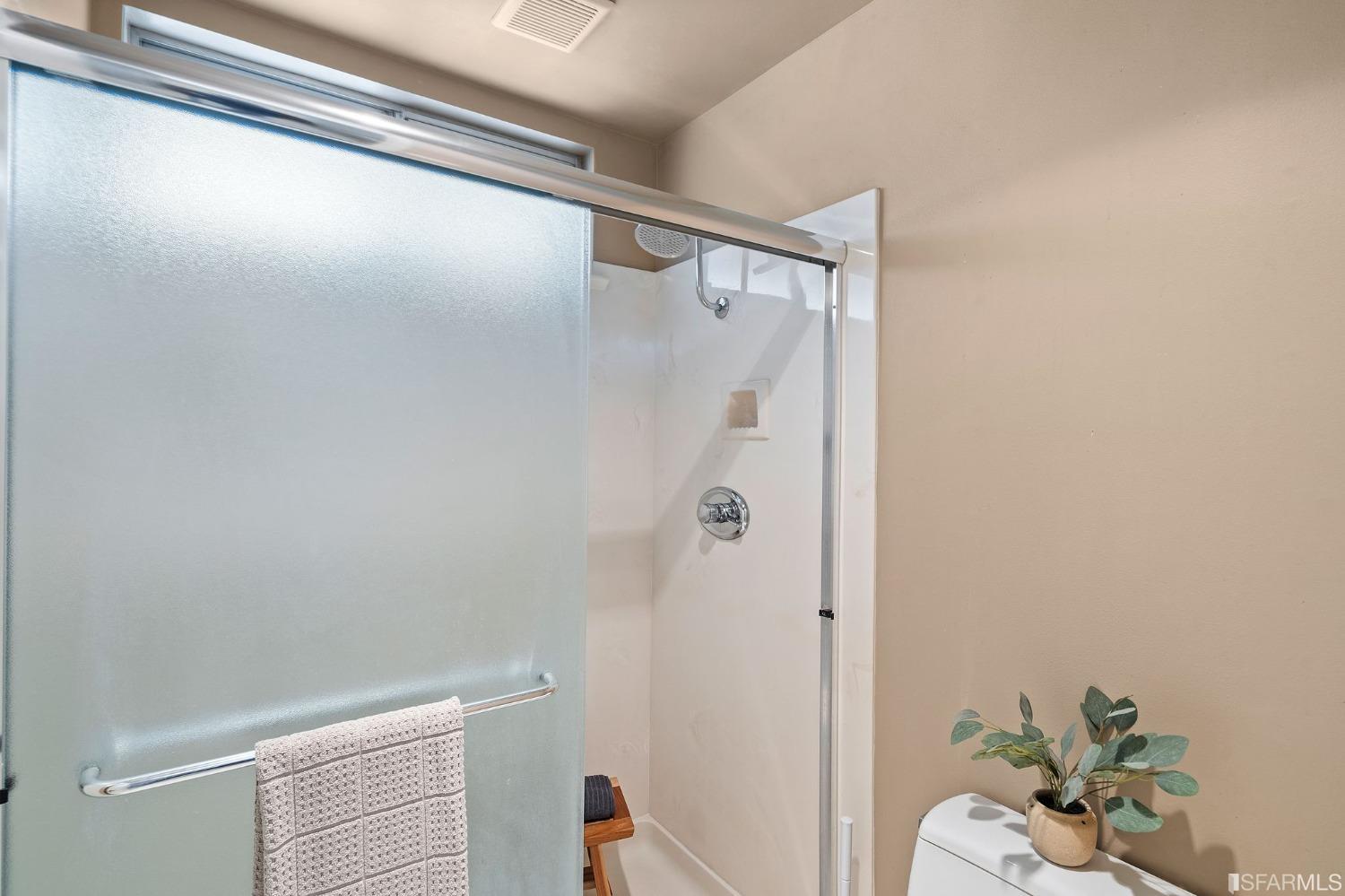 2590 Fox Circle Walnut Creek, CA 94596 - Photo 31 of 68 a bathroom with a shower and a toilet