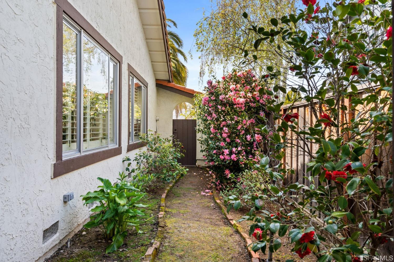 2590 Fox Circle Walnut Creek, CA 94596 - Photo 33 of 68 a bunch of flowers in front of a house