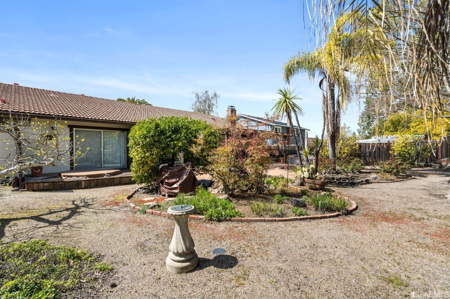 2590 Fox Circle Walnut Creek, CA 94596 - Photo 35 of 68 a front view of a house with a yard and potted plants