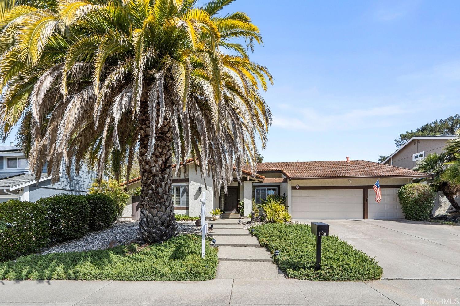 2590 Fox Circle Walnut Creek, CA 94596 - Photo 56 of 68 a front view of a house with a yard and potted plants