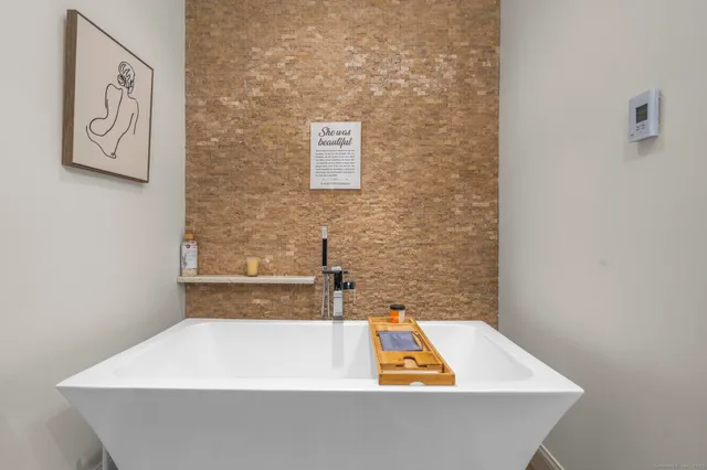 a view of a bathtub in a bathroom