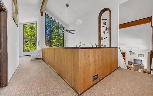 a view of a living room with furniture