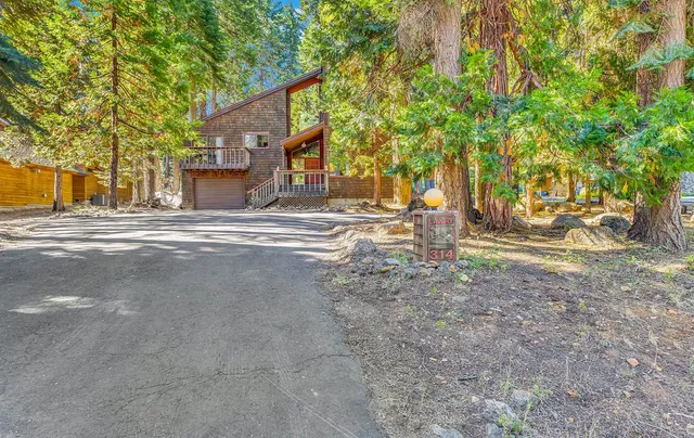 a view of a house with a street