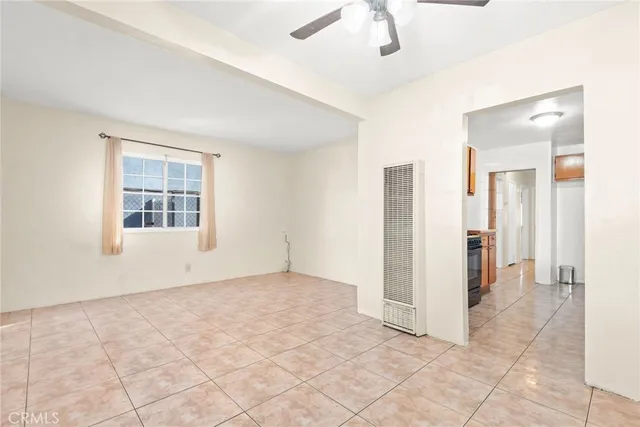 a kitchen with stainless steel appliances a stove a microwave and a refrigerator