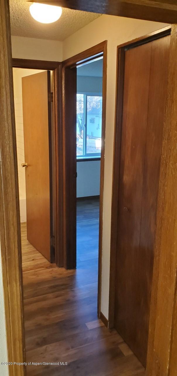 1012-1018 Stillwell Avenue Rifle, CO 81650 - Photo 13 of 15 a view of wooden floor