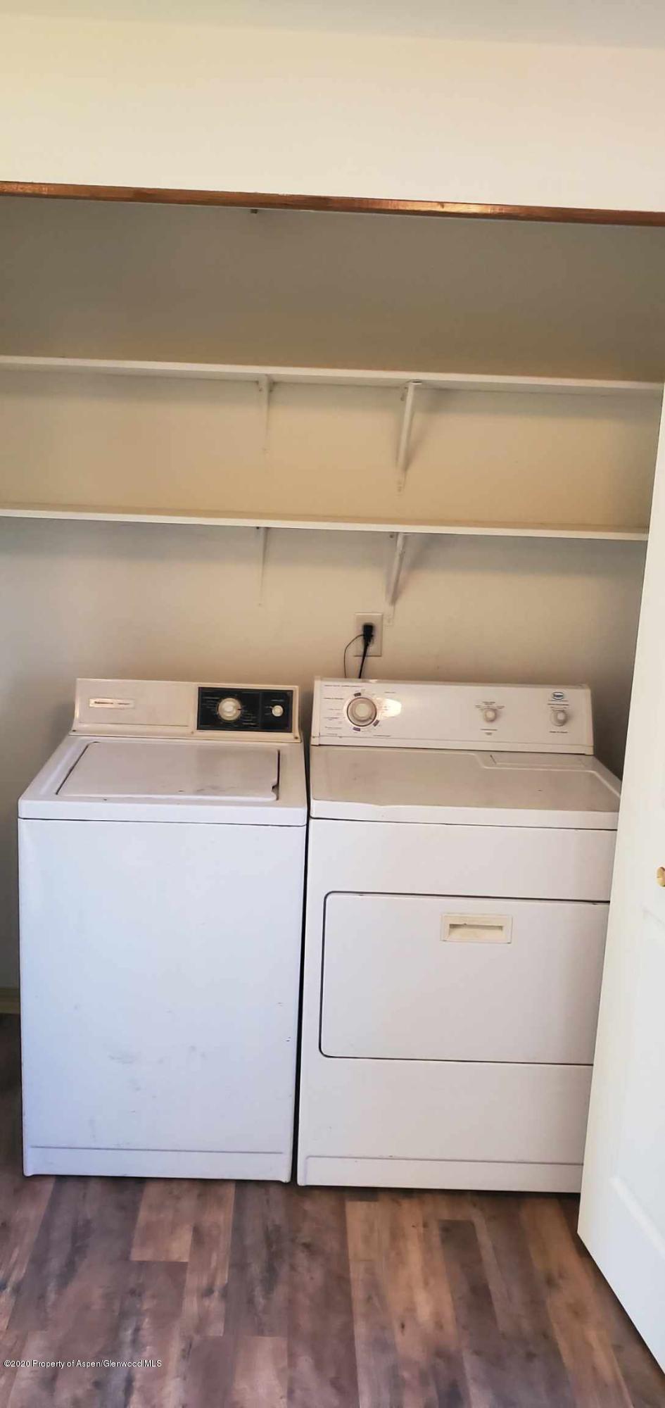1012-1018 Stillwell Avenue Rifle, CO 81650 - Photo 14 of 15 a utility room with dryer and washer