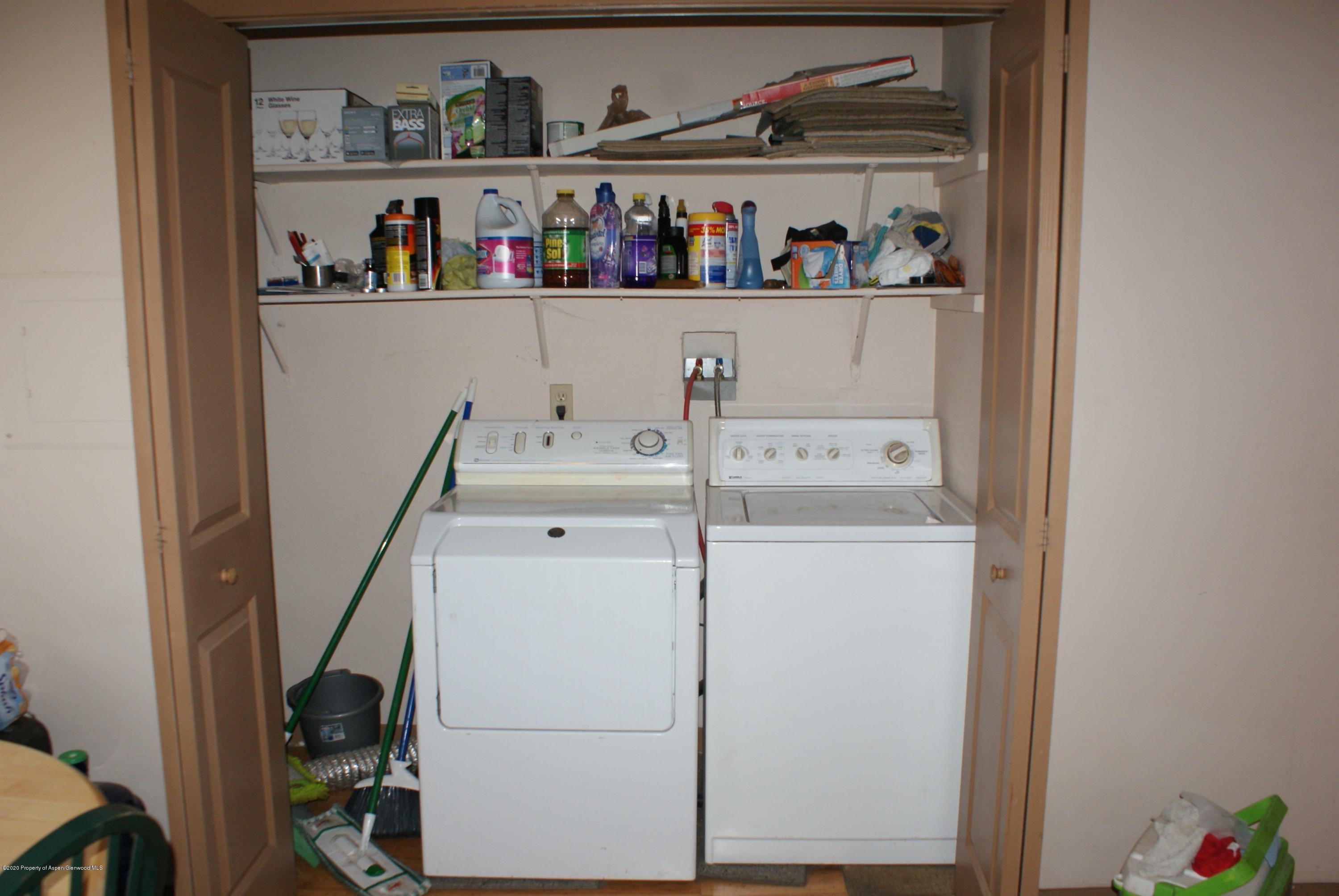 1012-1018 Stillwell Avenue Rifle, CO 81650 - Photo 6 of 15 a utility room with dryer and washer