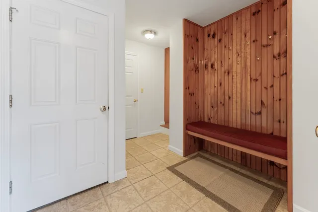 a view of bedroom with wooden floor