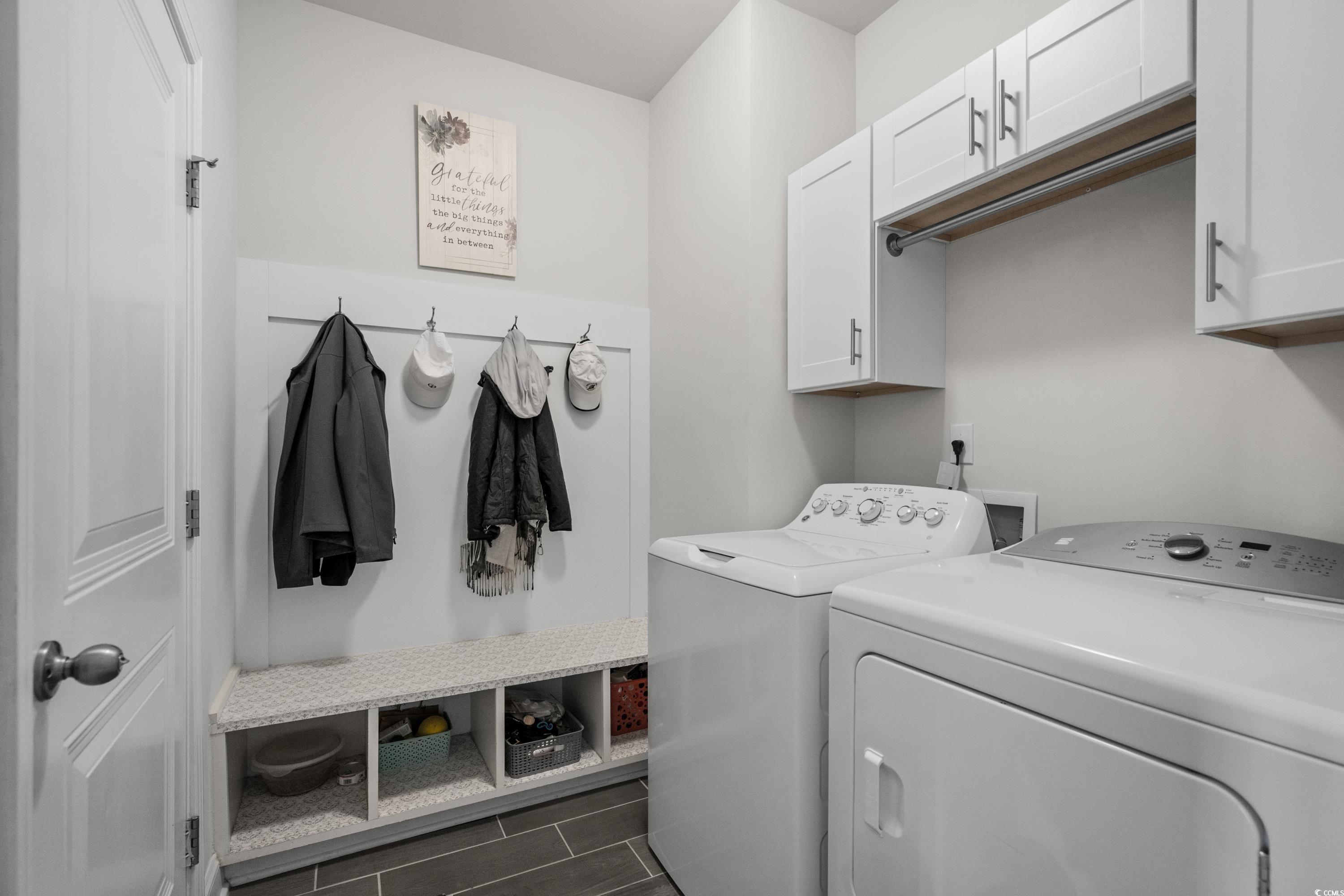 4284 Livorn Loop Myrtle Beach, SC 29579 - Photo 24 of 40 Laundry area with cabinet space and washer and dry