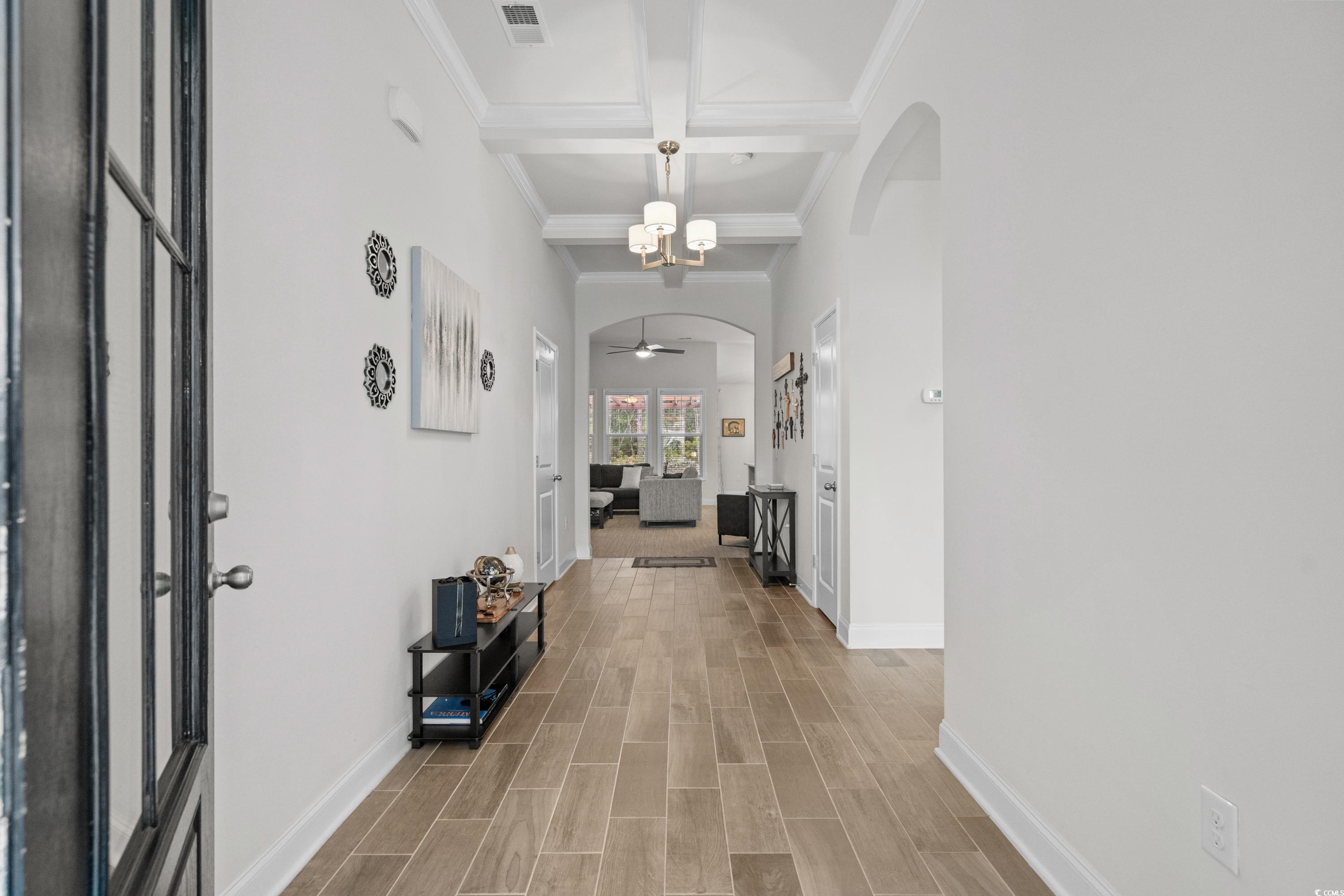 4284 Livorn Loop Myrtle Beach, SC 29579 - Photo 4 of 40 Corridor featuring baseboards, visible vents, coff