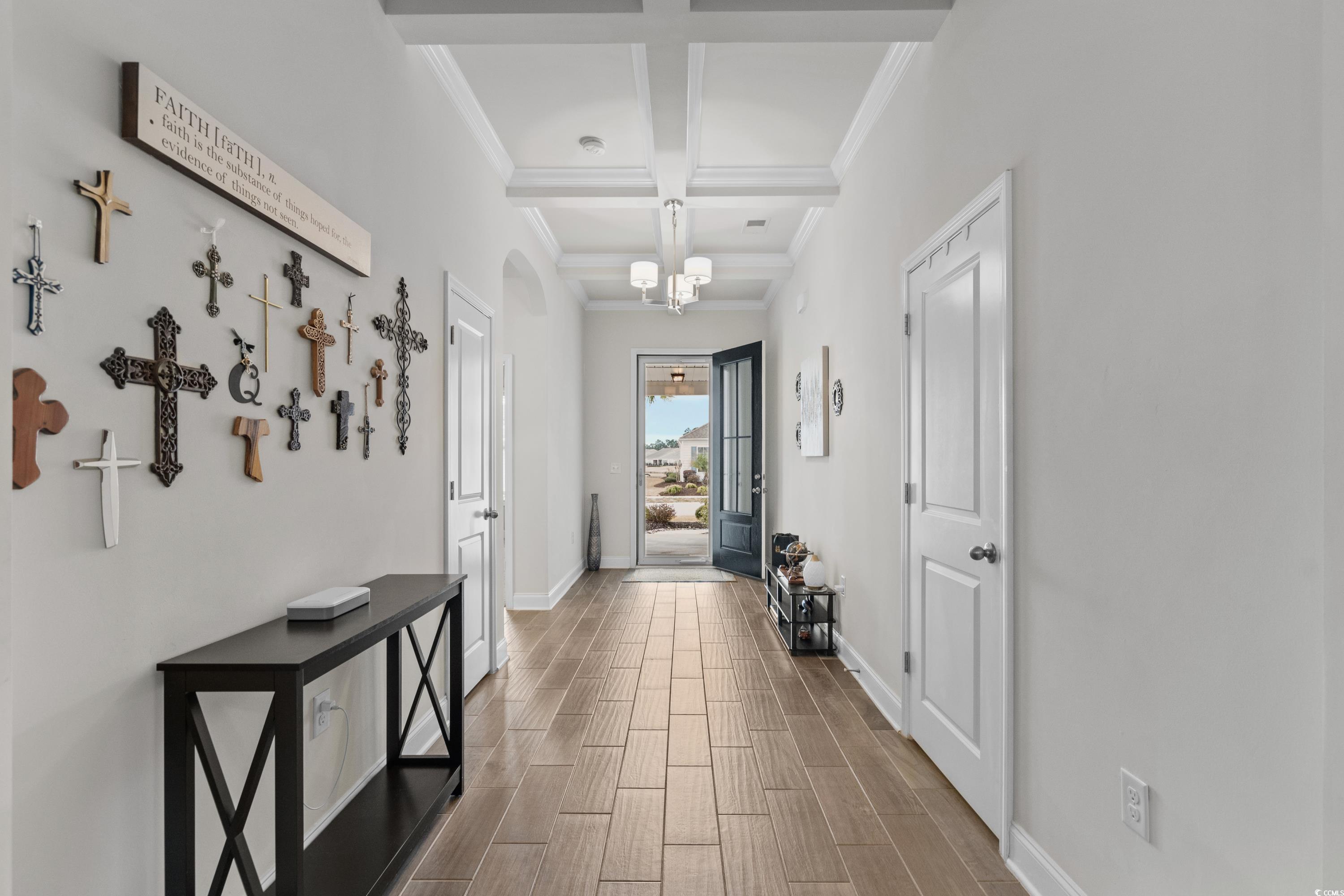 4284 Livorn Loop Myrtle Beach, SC 29579 - Photo 5 of 40 Corridor with baseboards, coffered ceiling, wood t