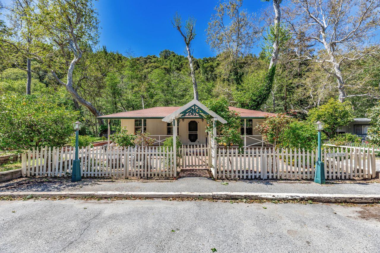 2 Camp Steffani Carmel Valley, CA 93924 - Photo 1 of 45 a front view of a house with a garden