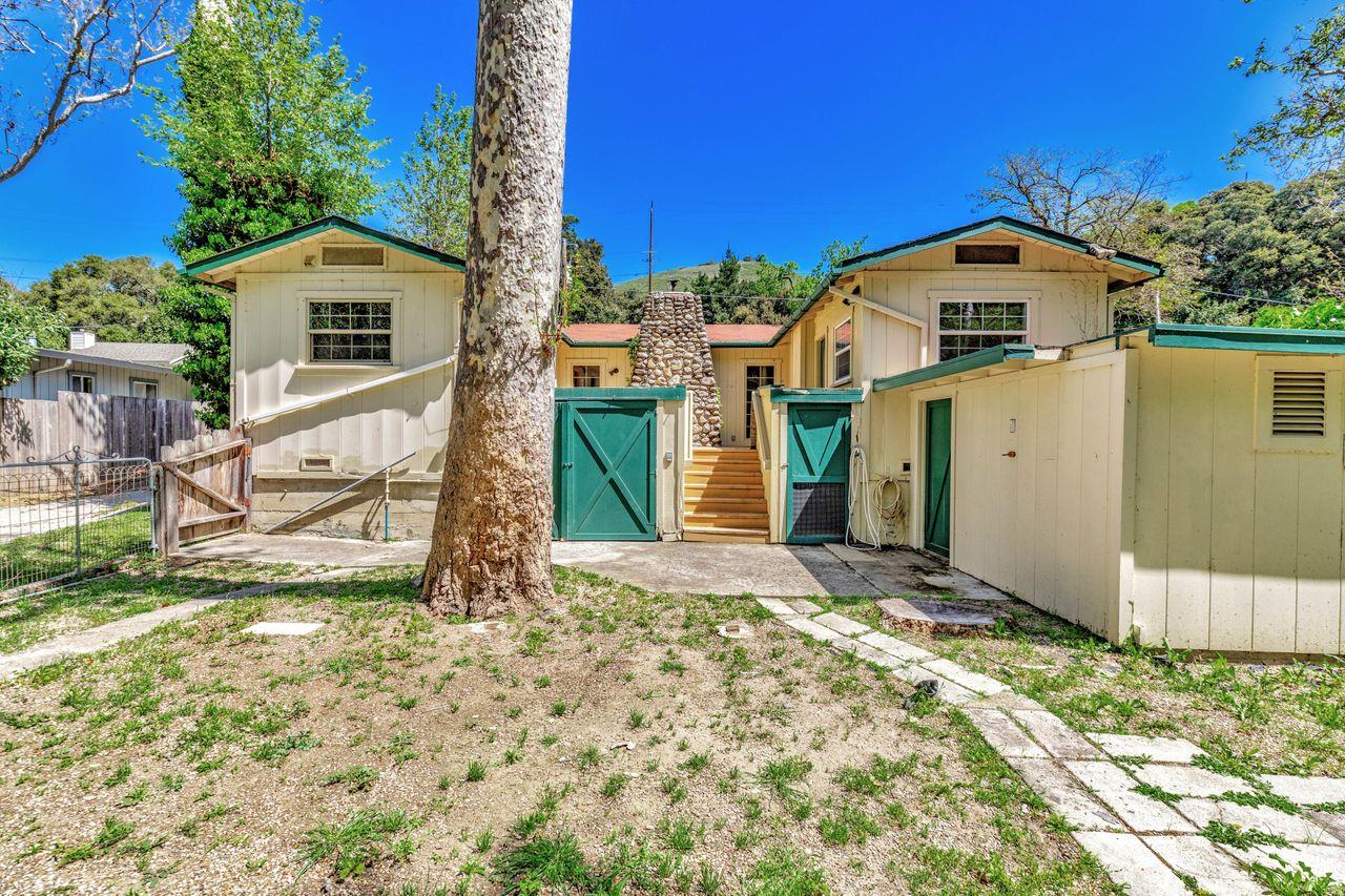 2 Camp Steffani Carmel Valley, CA 93924 - Photo 26 of 45 a front view of a house with a yard and garage